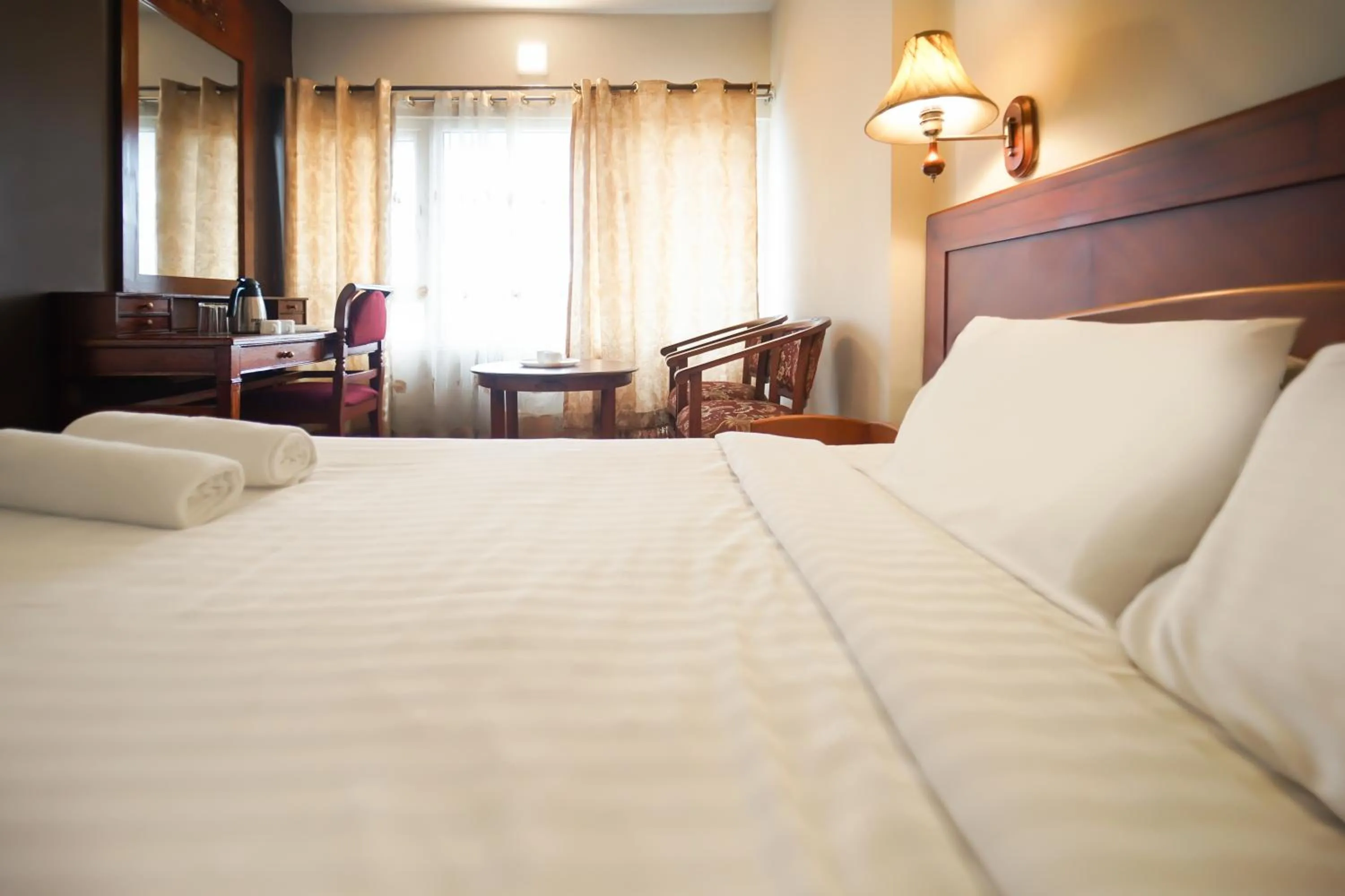 Bed in Hotel Jc Grand