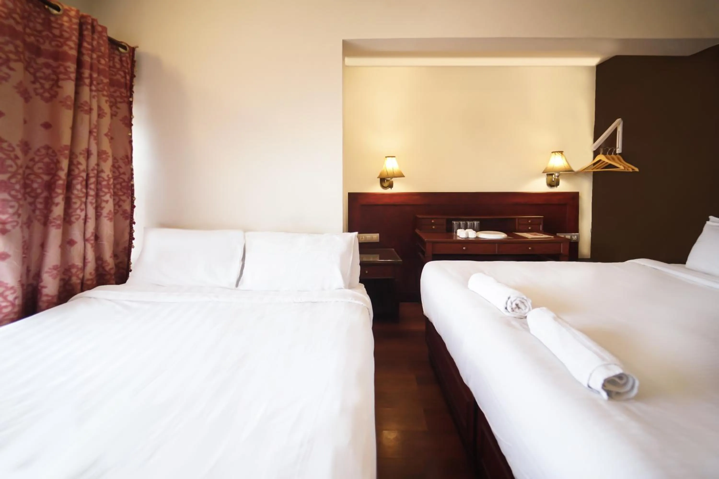 Bed in Hotel Jc Grand