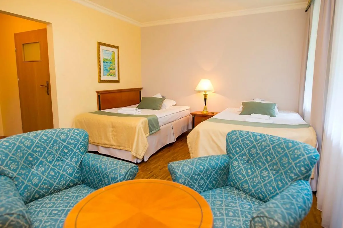 Bed in Hotel Mir-Jan SPA