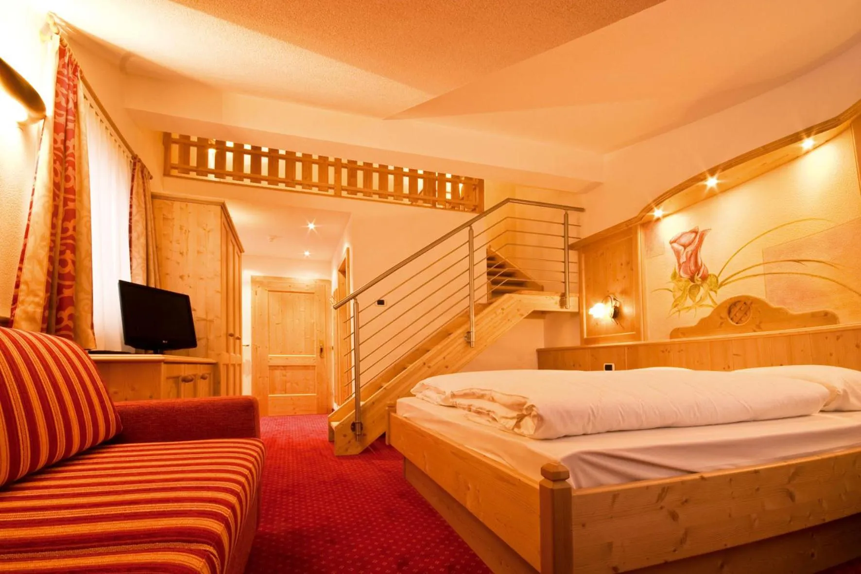 Photo of the whole room, Bed in Loewe Dolomites