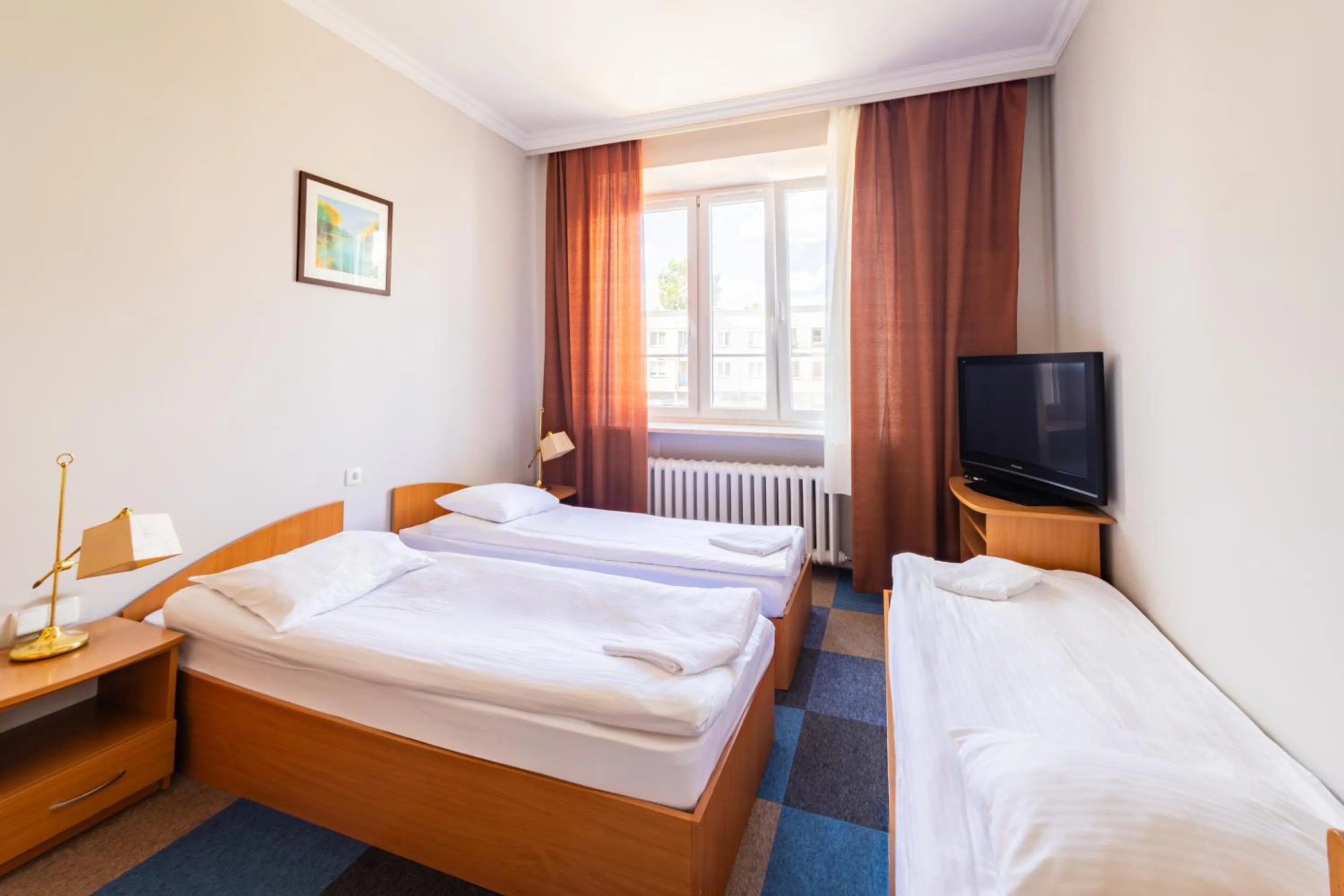 Communal lounge/ TV room, Bed in Noclegi Stadion Bed & Breakfast