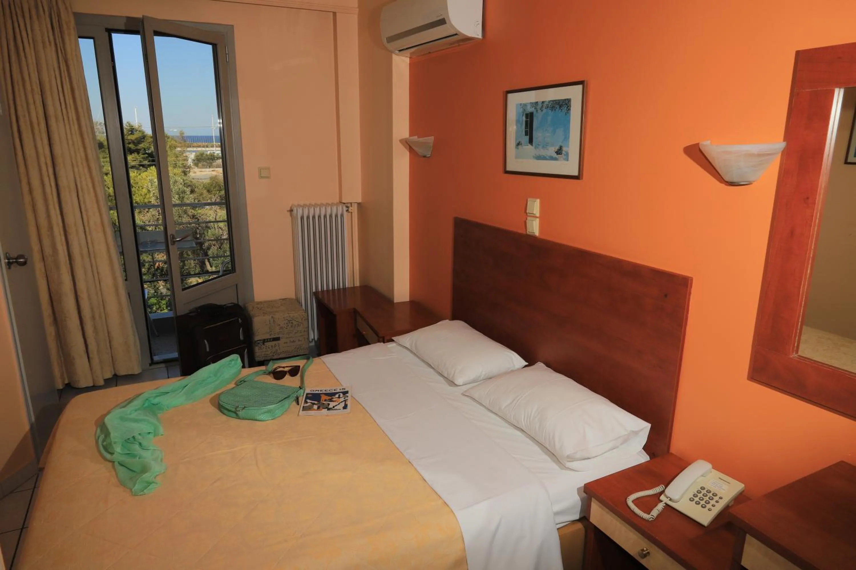 Bed in IKAROS Hotel ELLINIKO