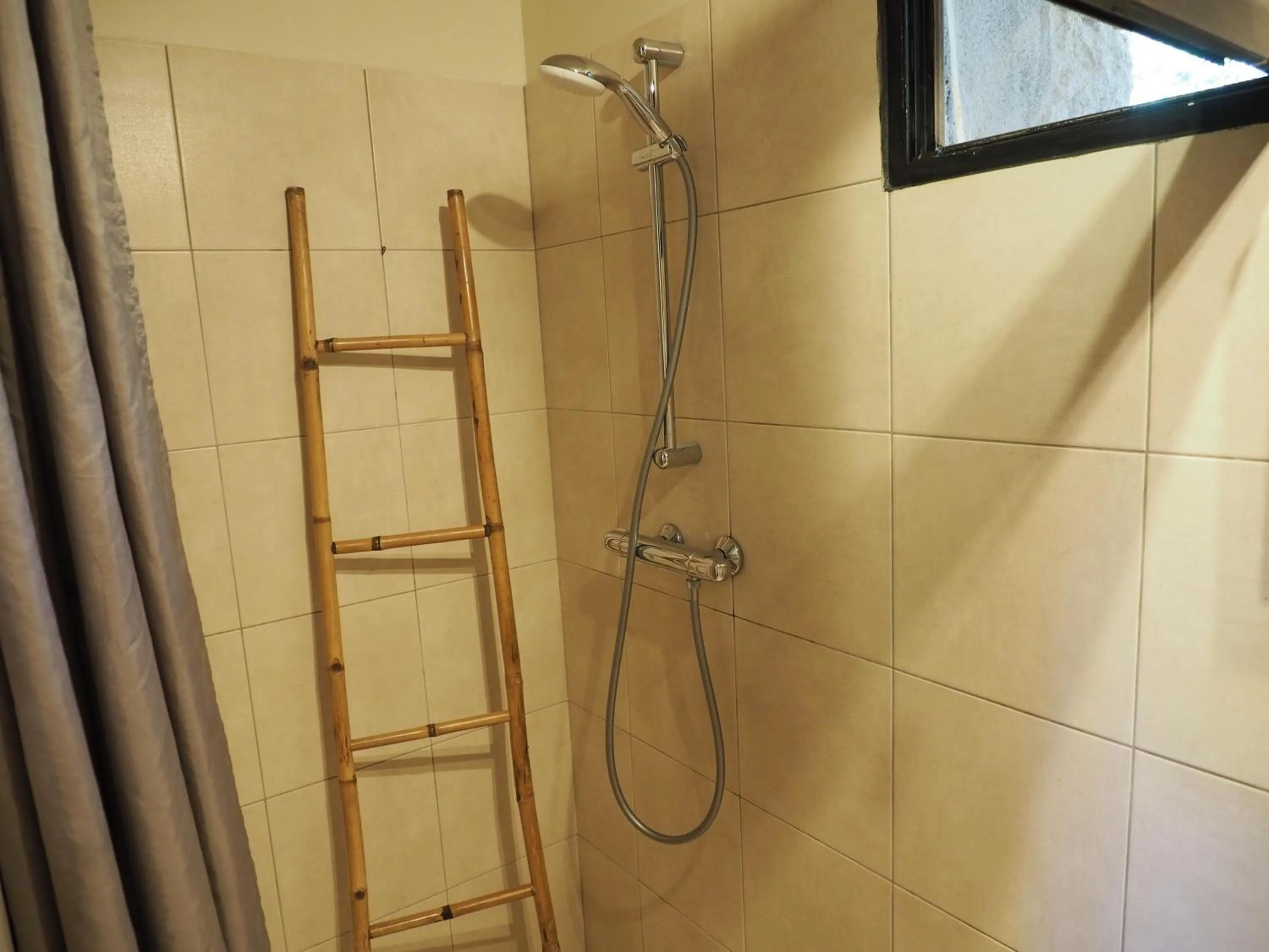 Shower in Maranatha, front de mer avec plage