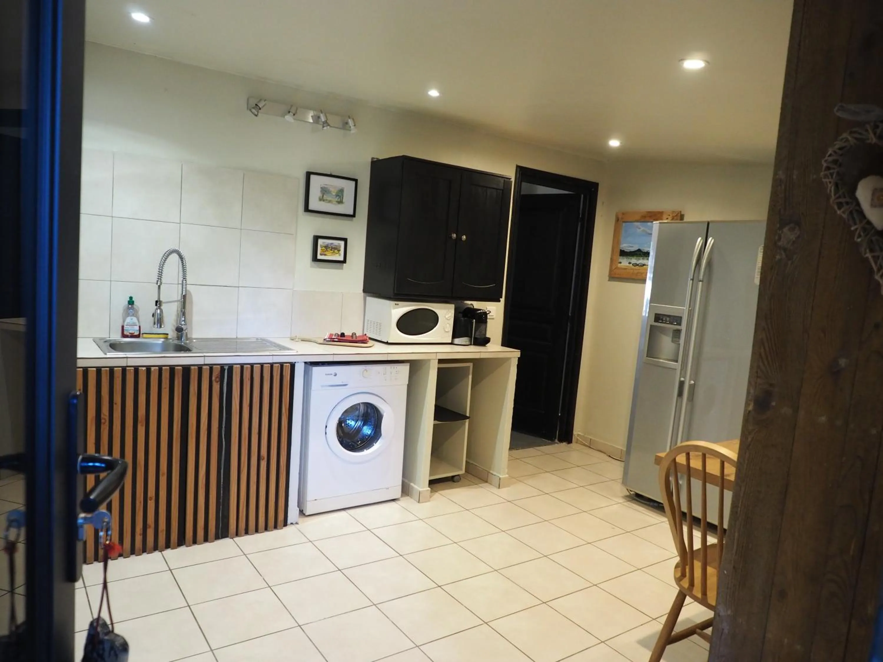 Kitchen or kitchenette in Maranatha, front de mer avec plage