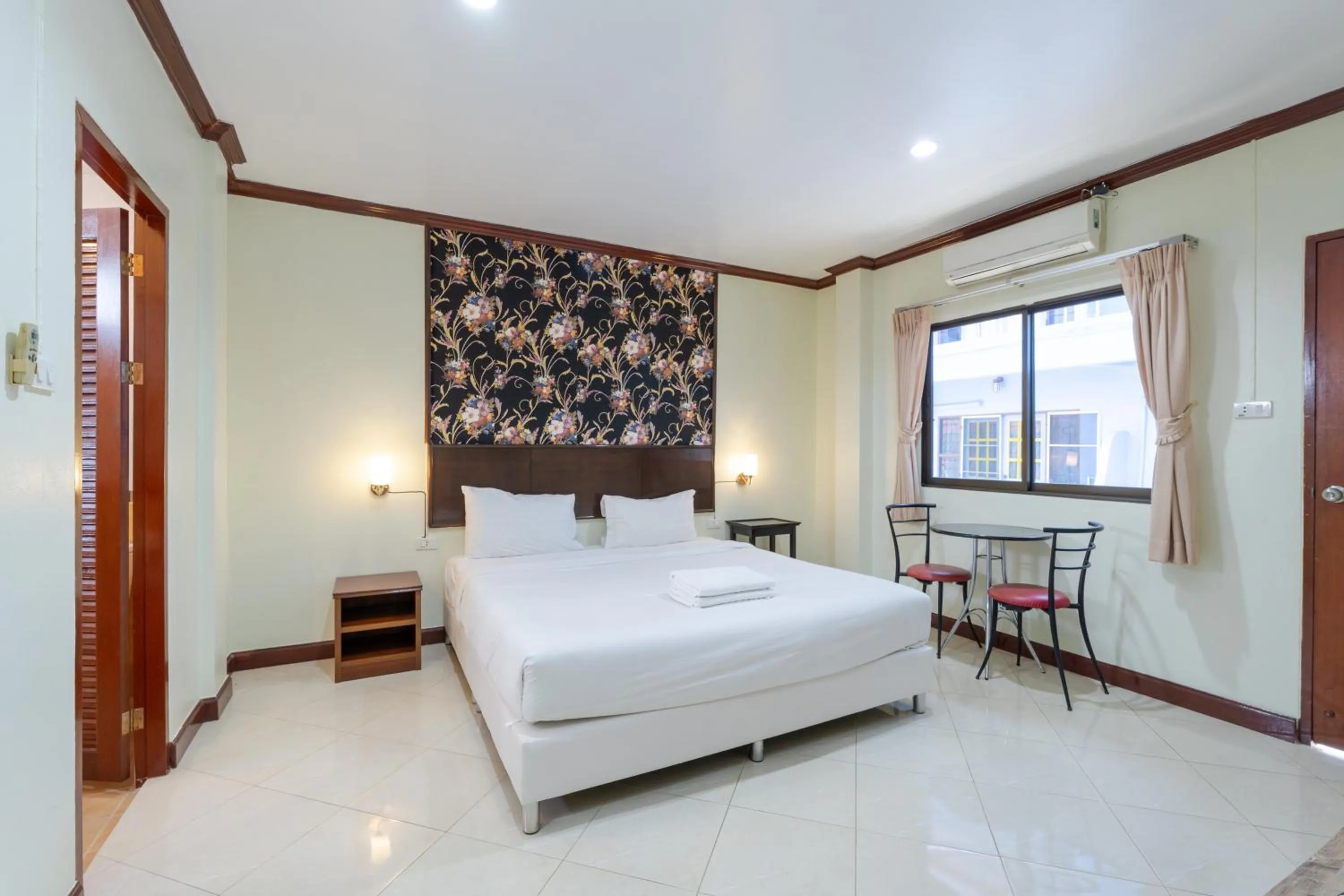 Bed in Amarin Hotel Patong