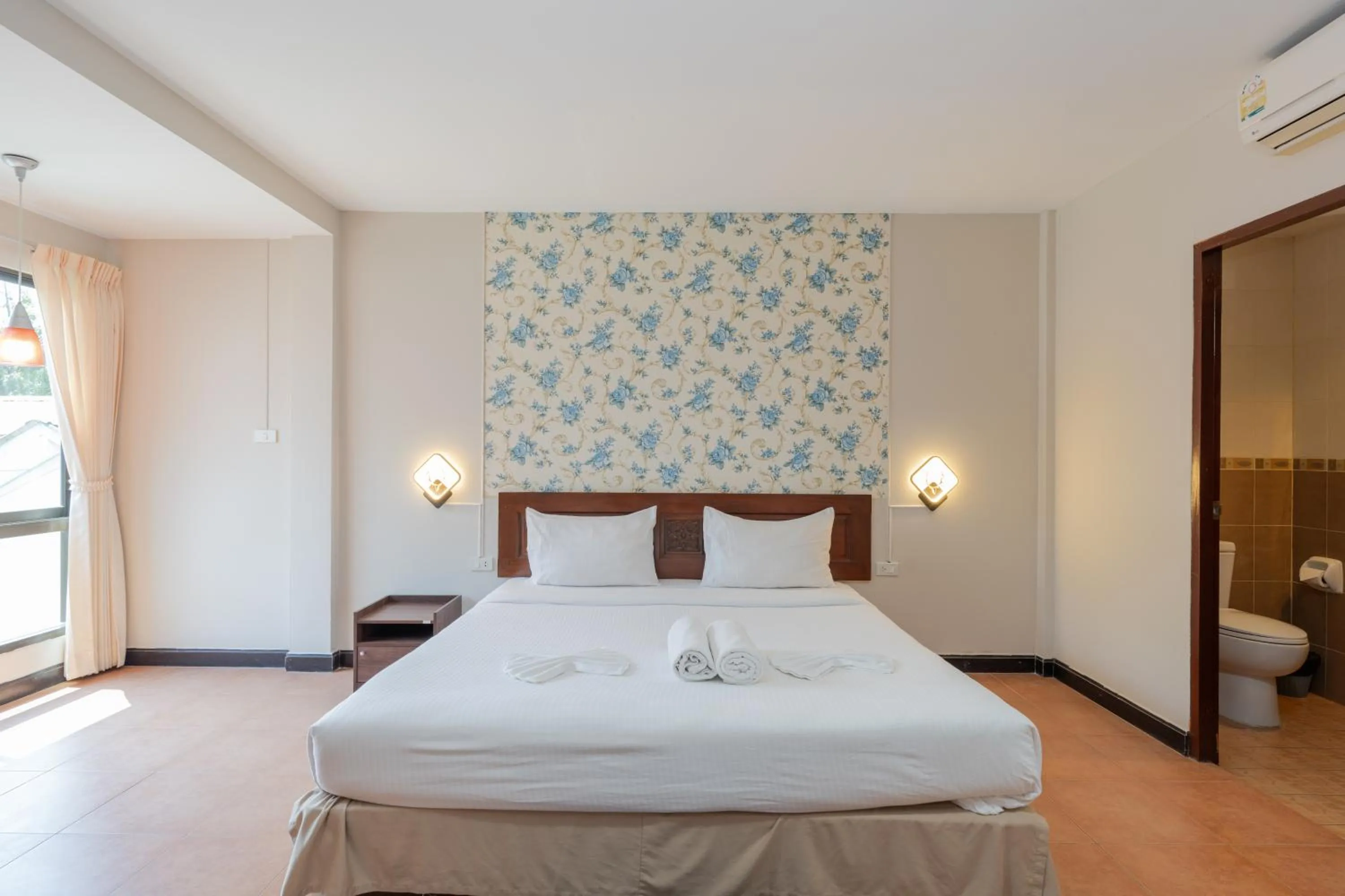 Bed in Amarin Hotel Patong