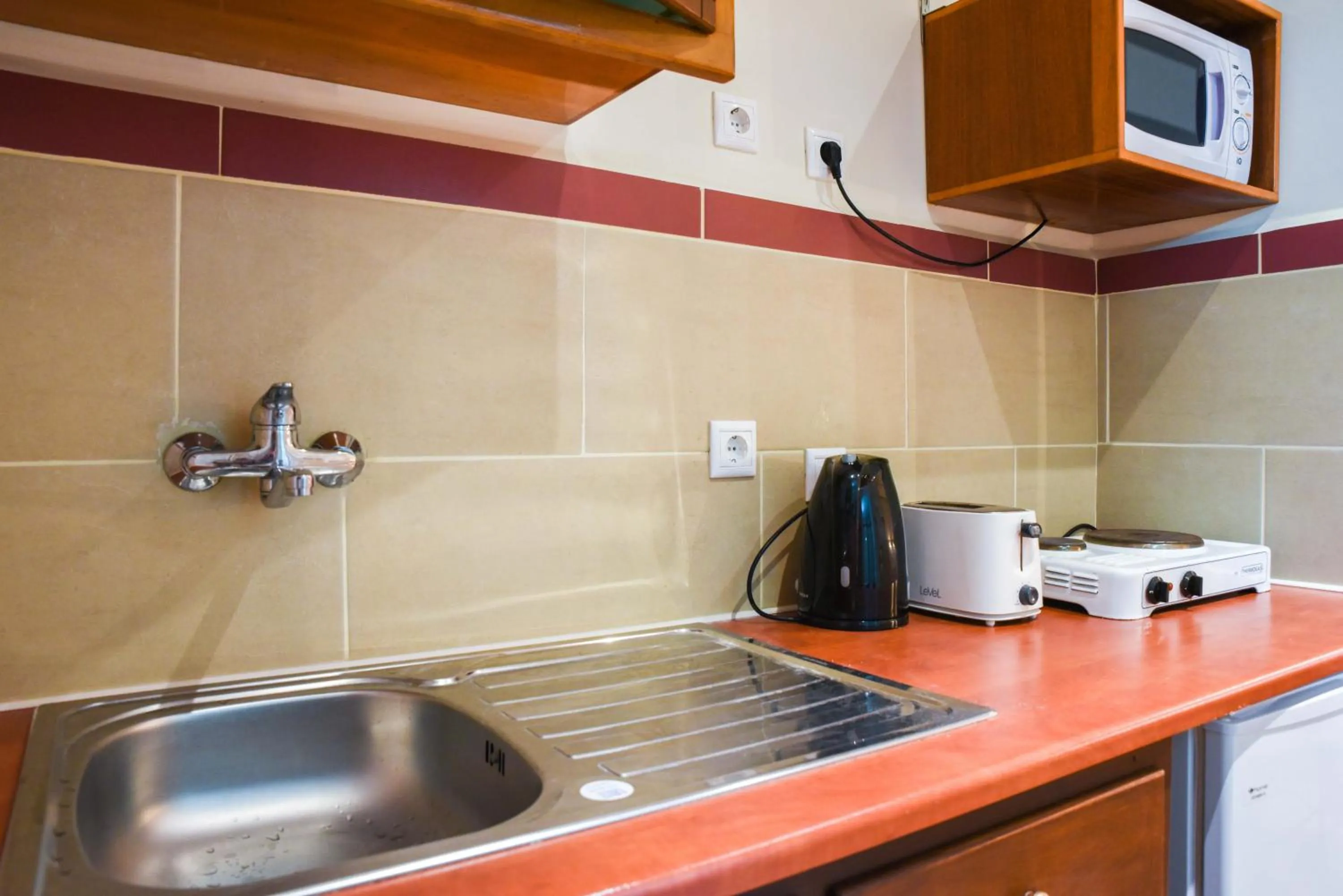 Kitchen or kitchenette in Chrysoula Hotel