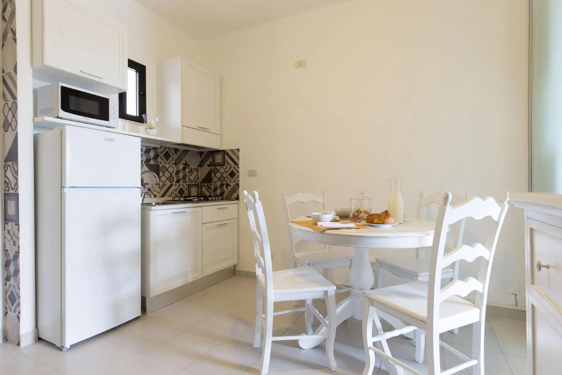 Kitchen or kitchenette in Centro Vacanze Poker