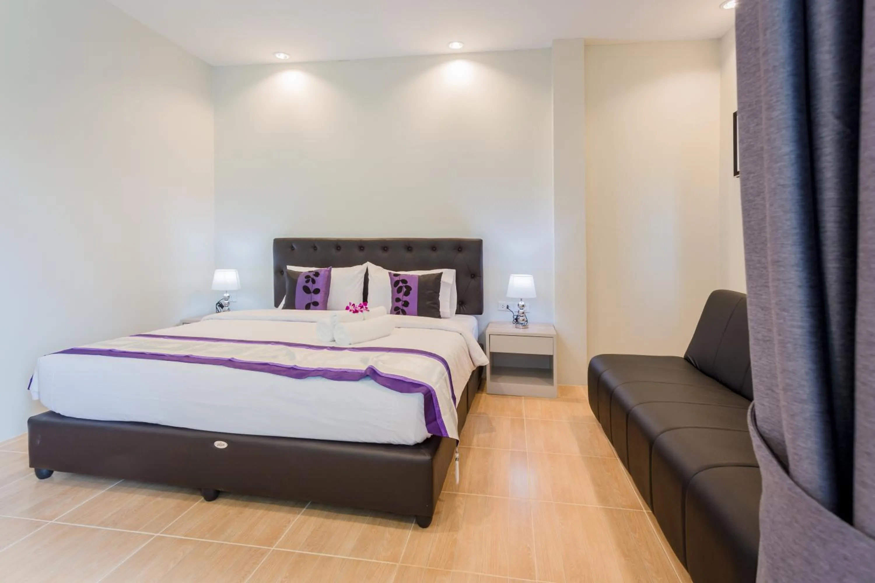 Photo of the whole room, Bed in Journey Residence Phuket