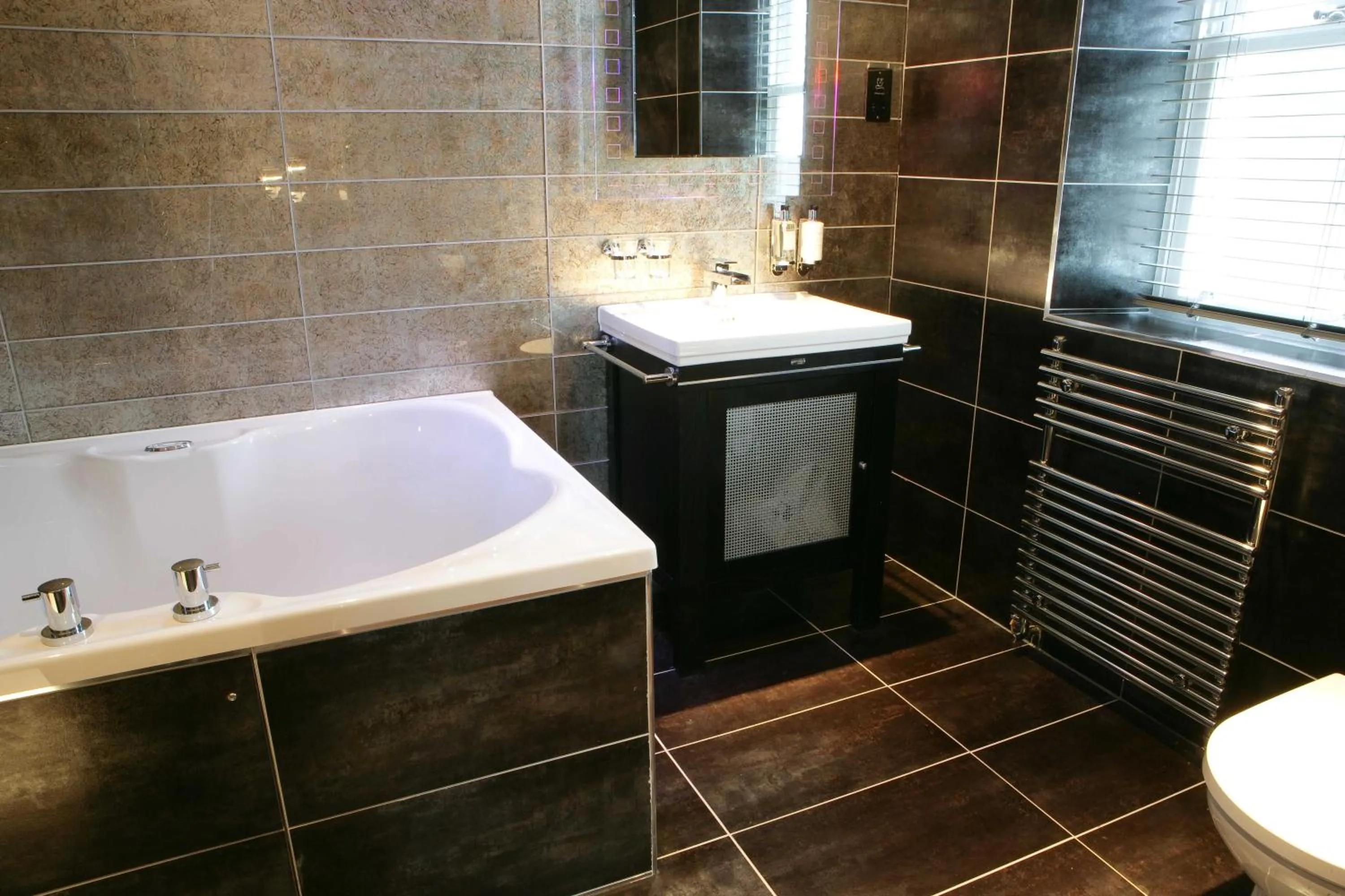 Bathroom in Windermere Suites