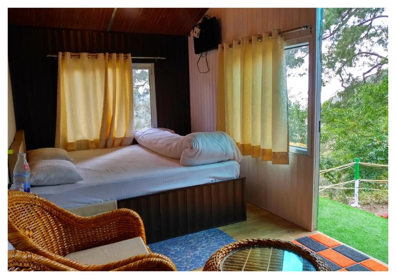 Bed in The Cocoon Camps & nature Resorts