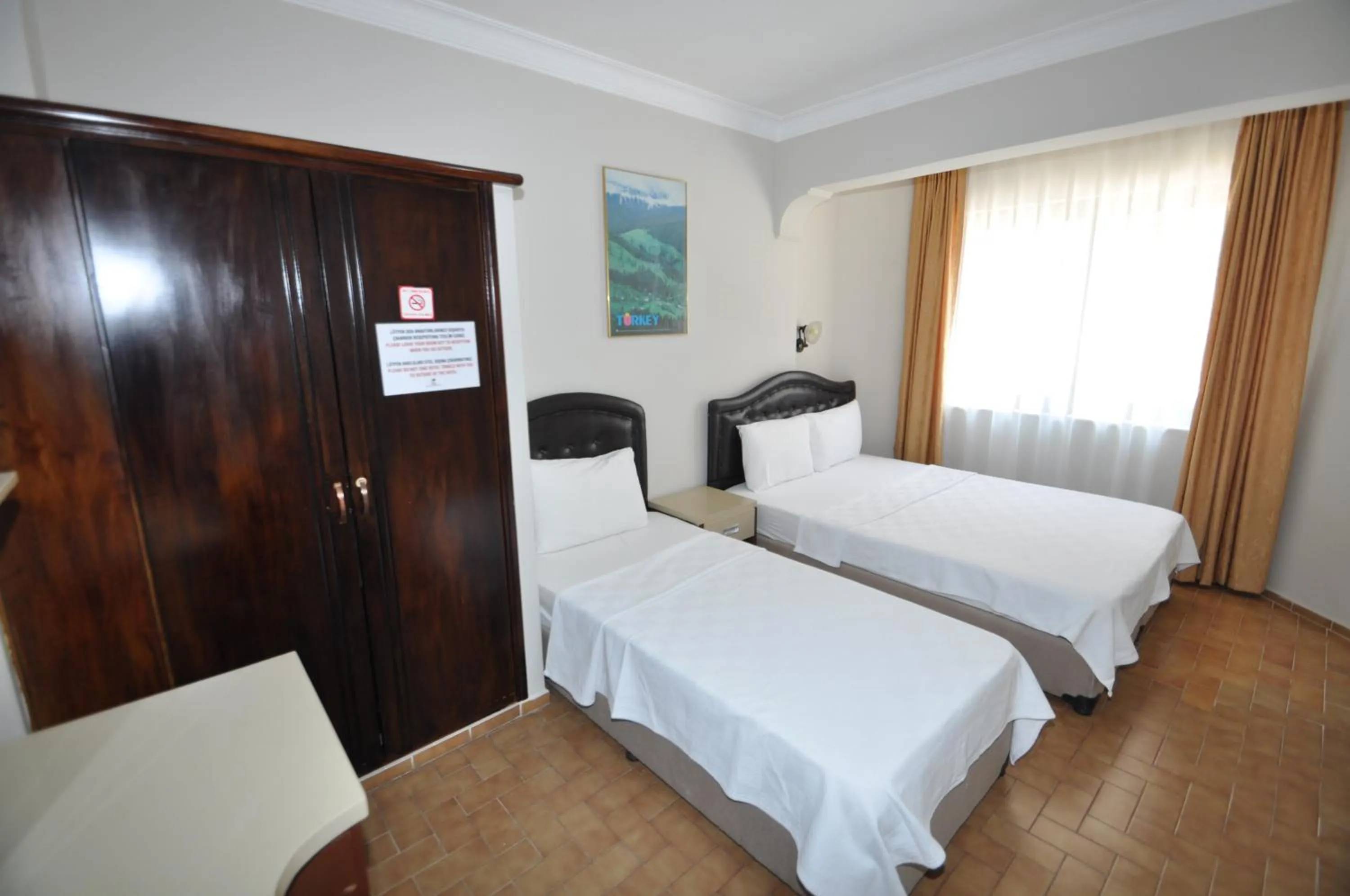 Bed in Defne & Zevkim Hotel