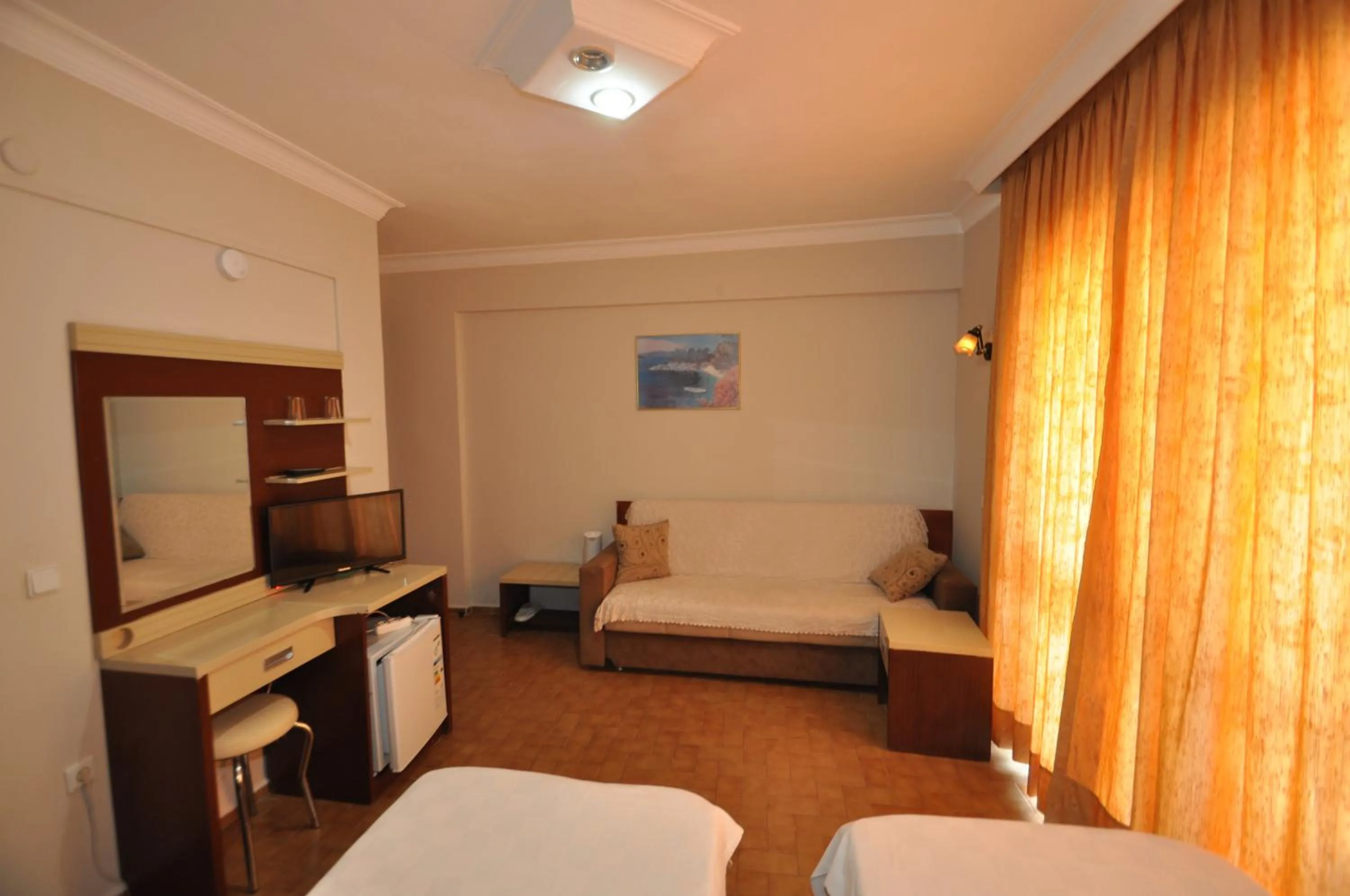 Bed in Defne & Zevkim Hotel