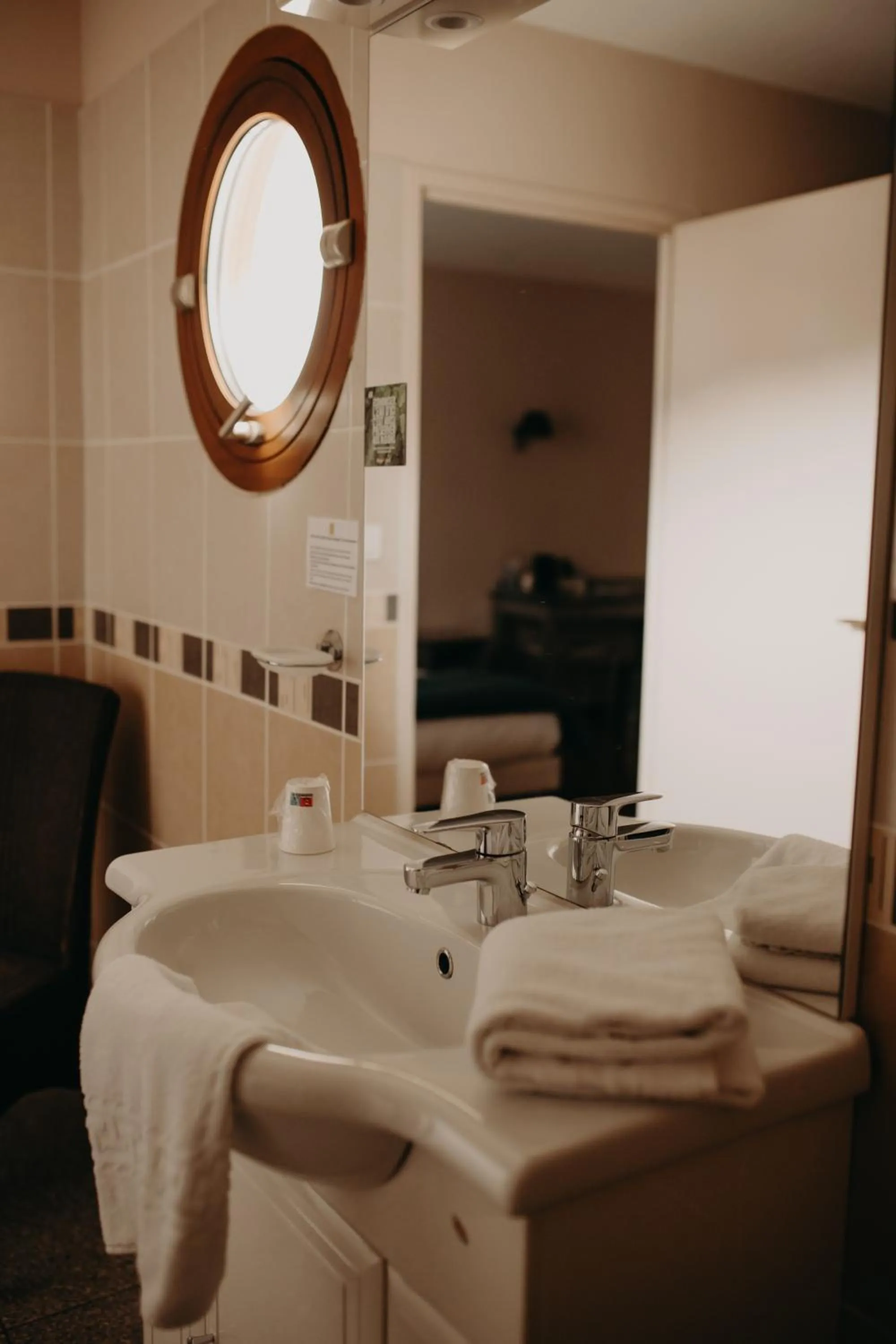 Bathroom in Logis - Hotel Restaurant du Parc