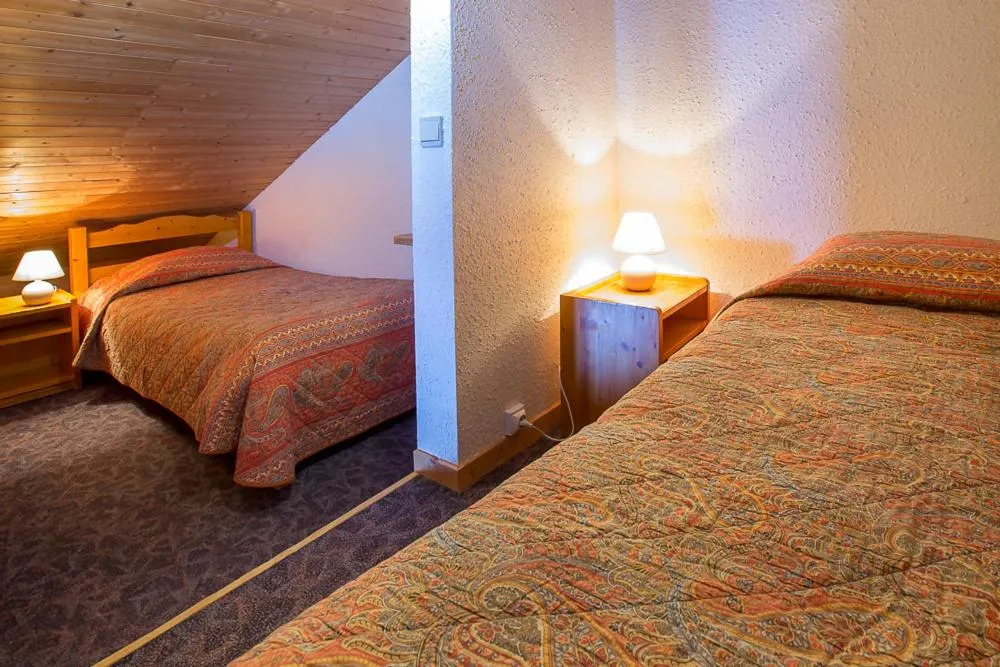 Bed in Hotel Les Lans