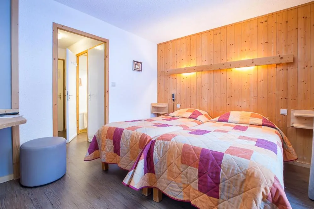 Bed in Hotel Les Lans