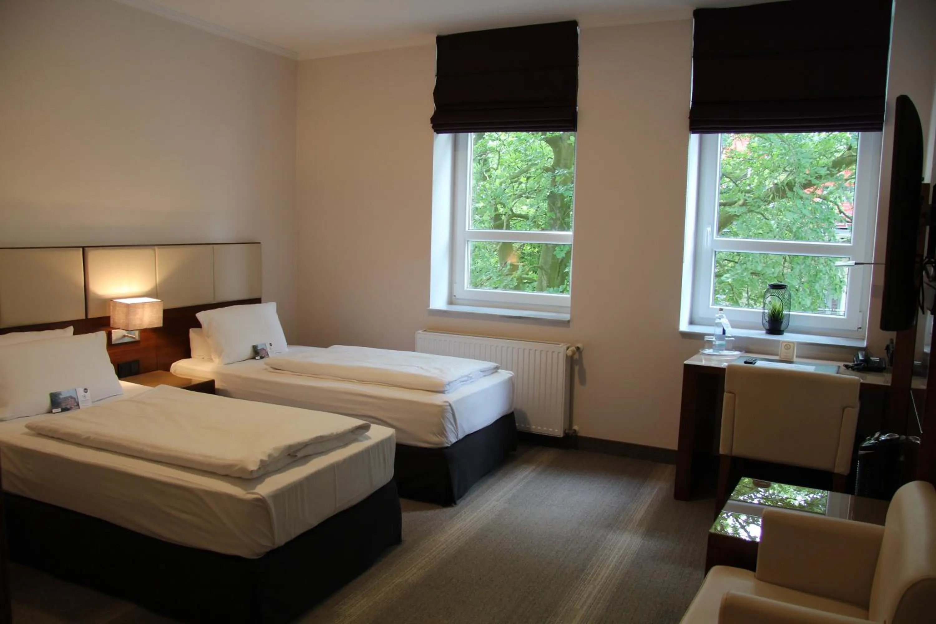 Photo of the whole room, Bed in Adena Hotel