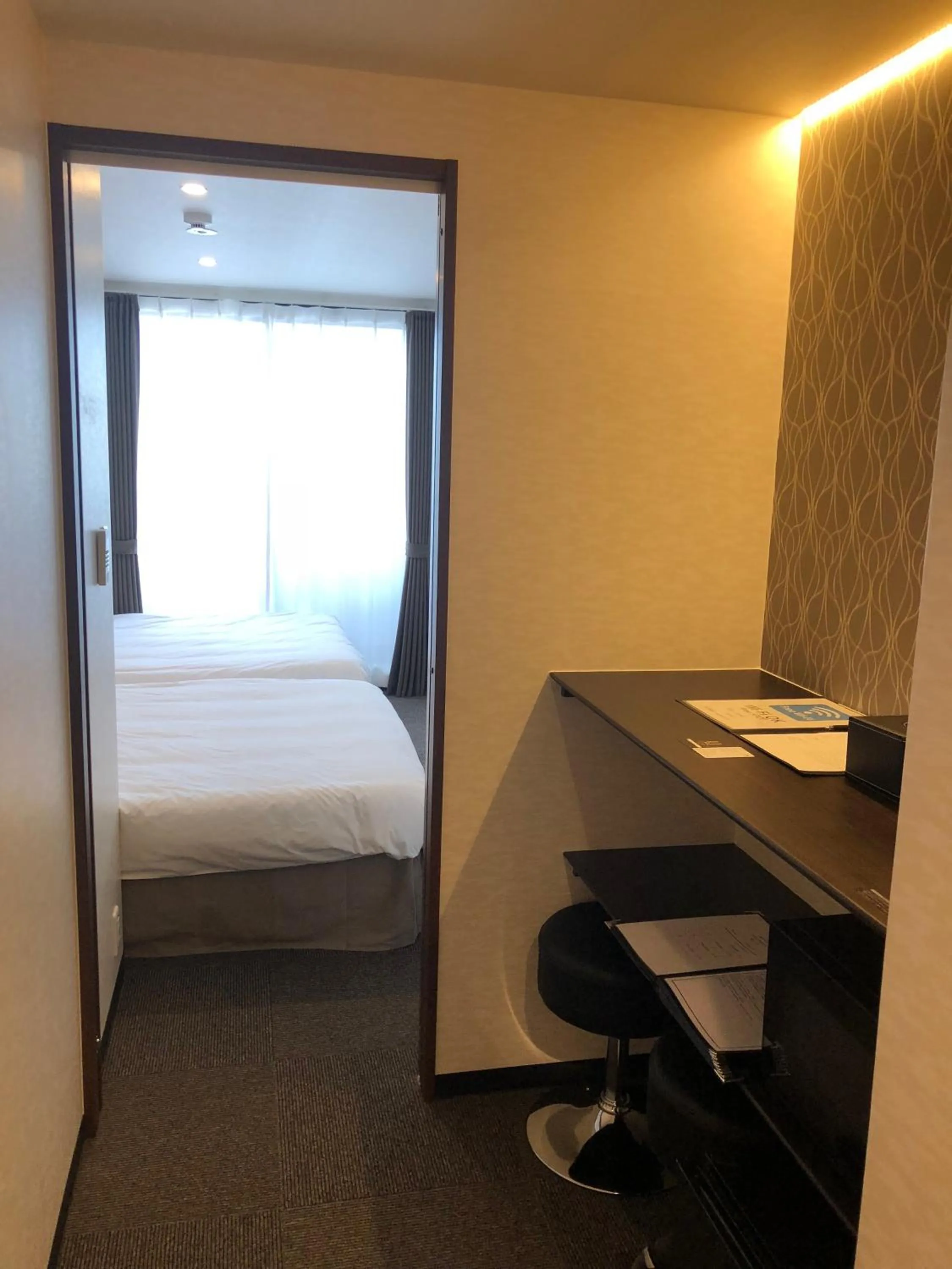 Photo of the whole room, Bed in UU Inn Kyoto