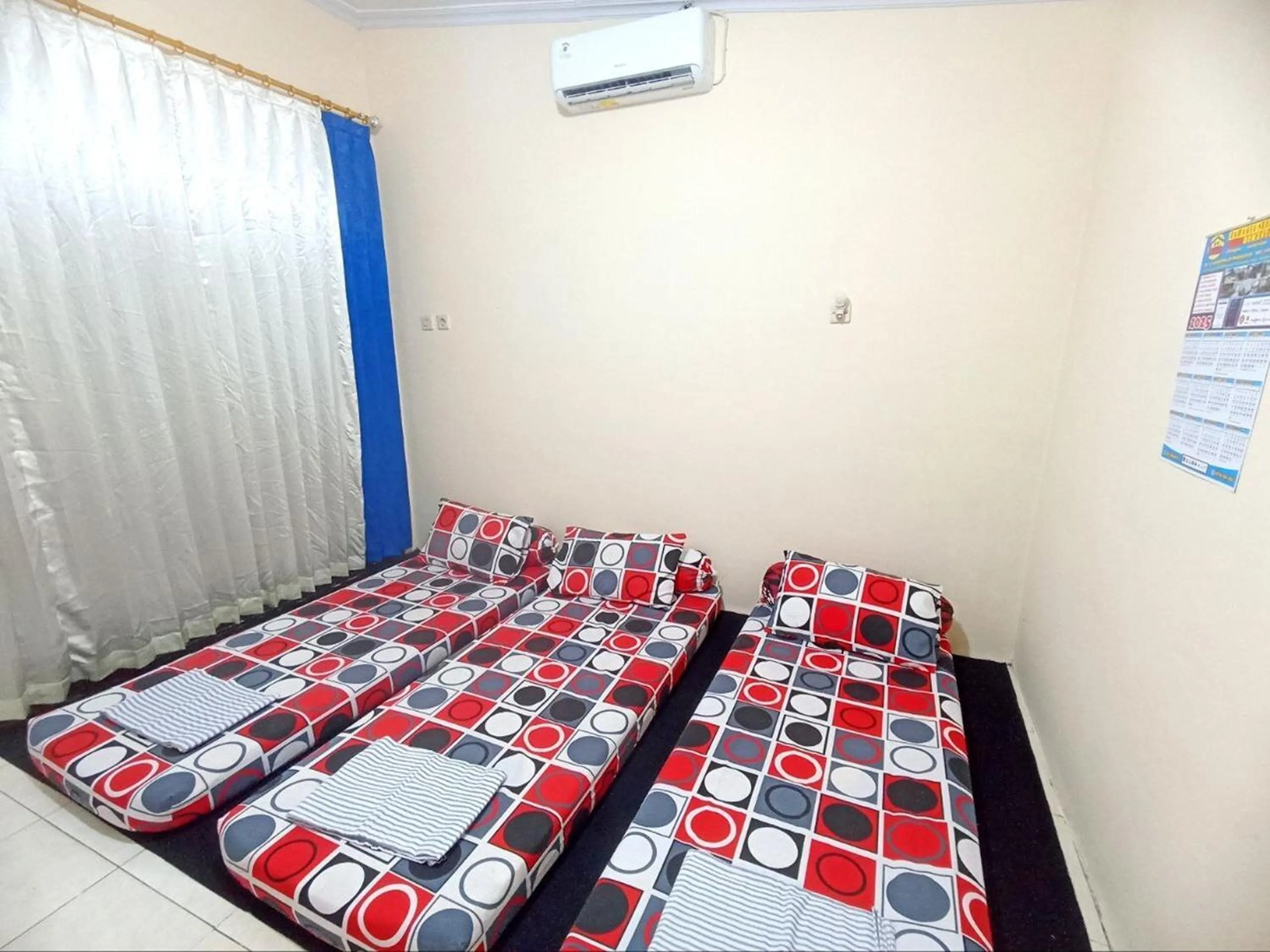 Bed in Bahagia Sederhana Homestay