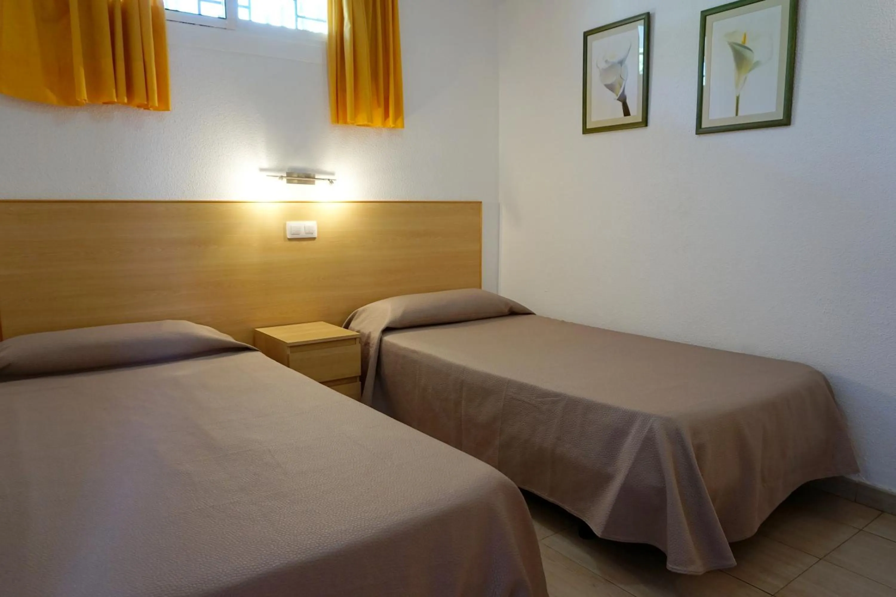 Bed in Apartamentos Ecuador