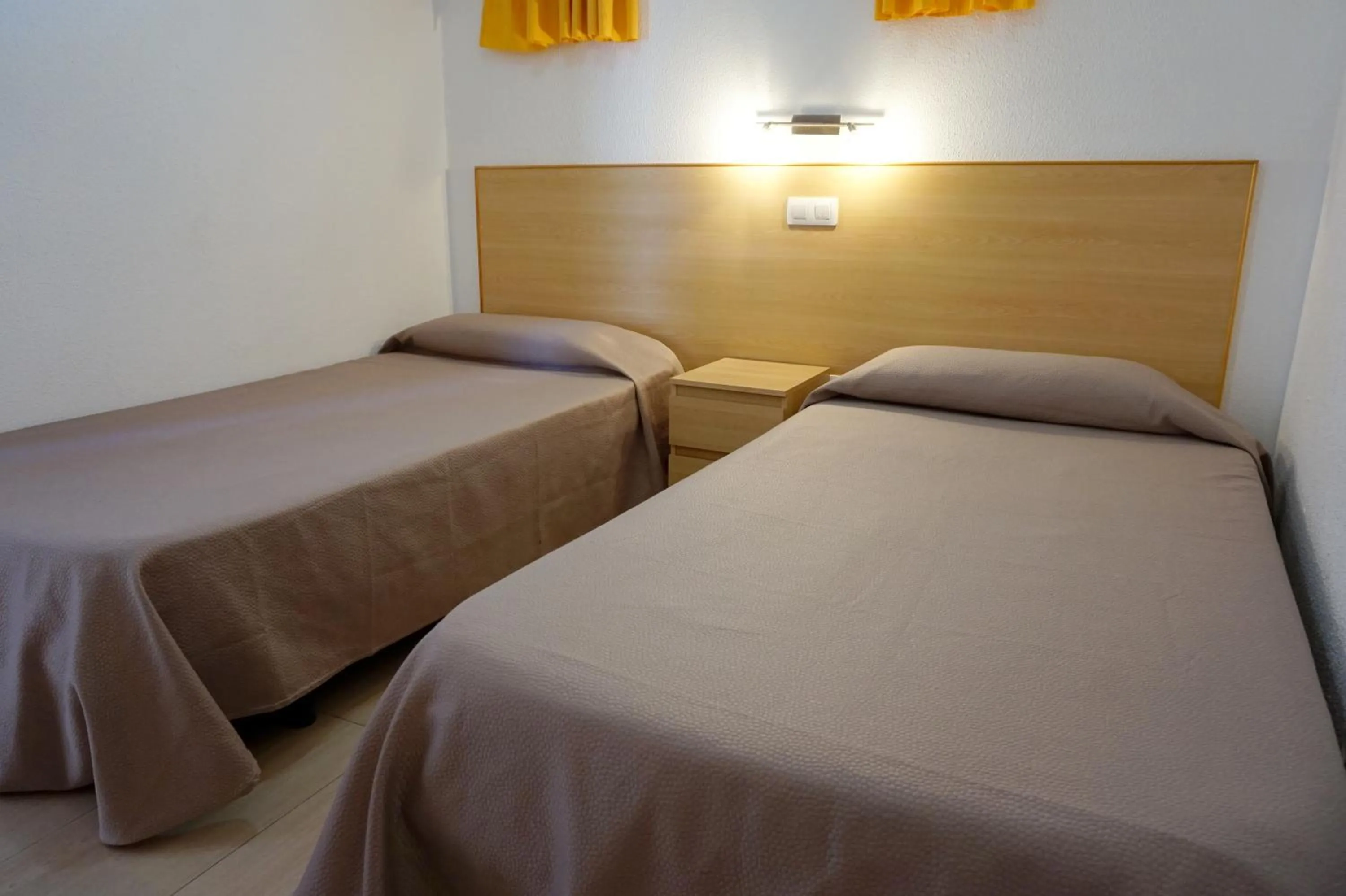 Bed in Apartamentos Ecuador