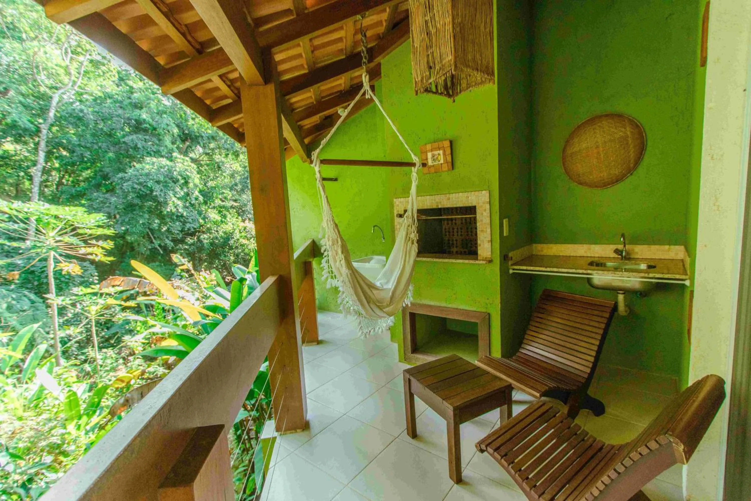 Seating area in Pousada Vila do Bosque