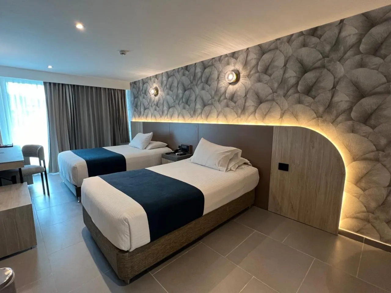 Bed in Zi One Luxury Hotel