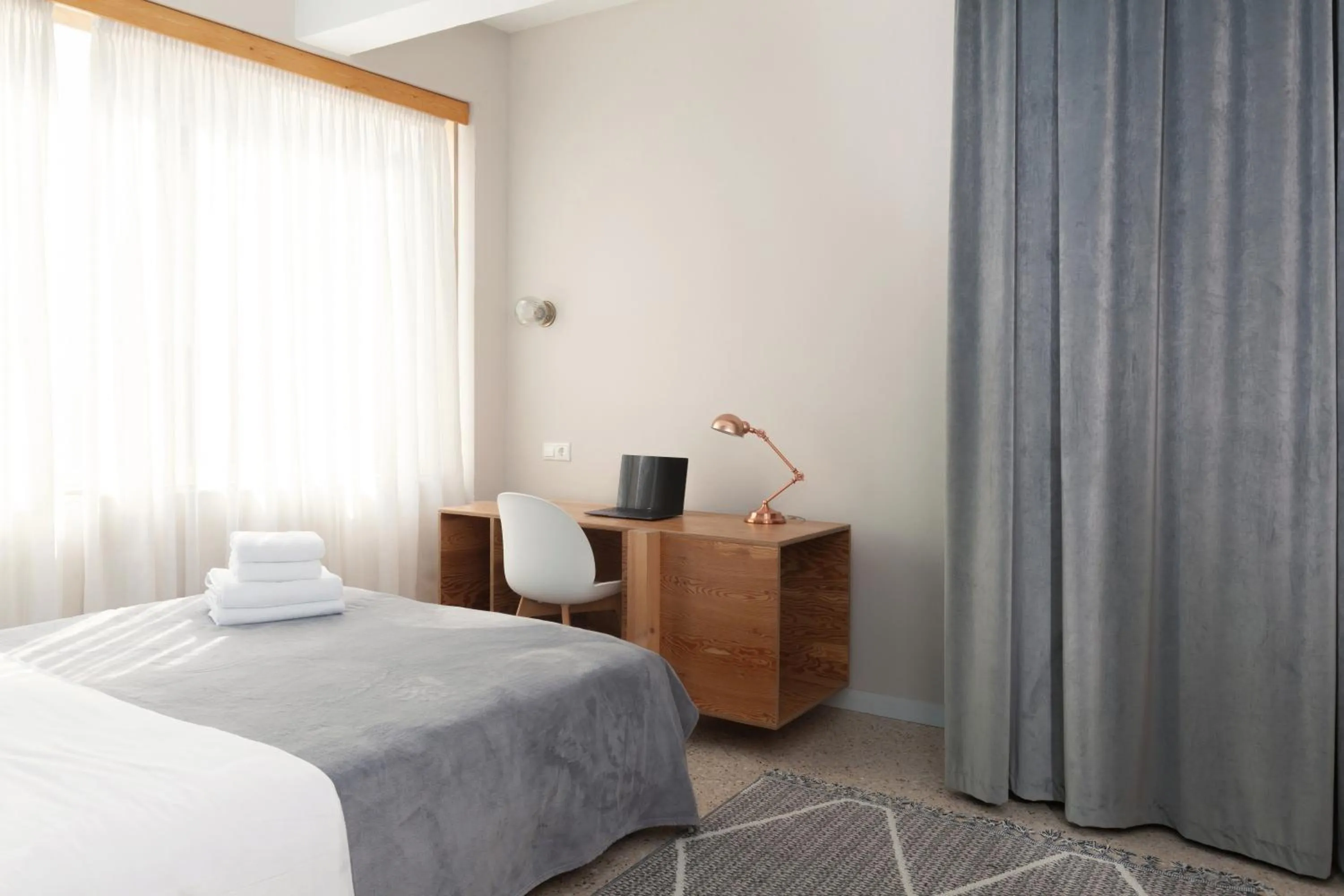 Bed in The Marble Suites, PLAKA