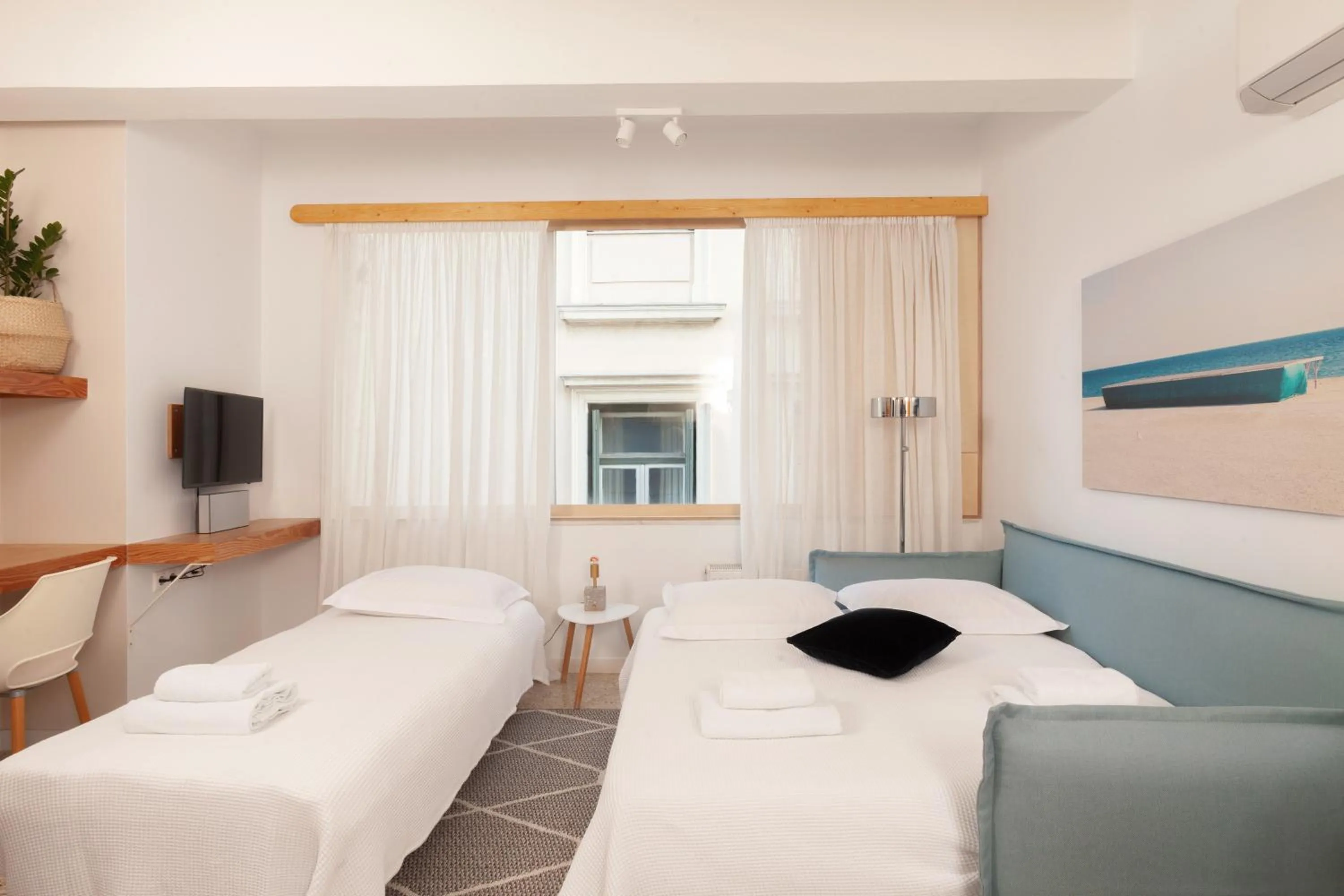 Bed in The Marble Suites, PLAKA