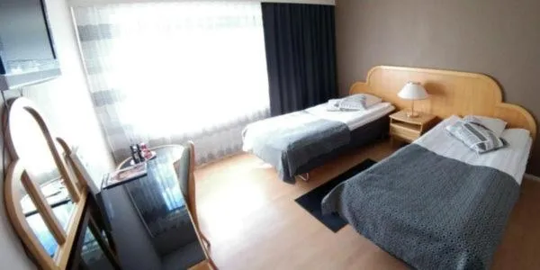 Photo of the whole room, Bed in Hotelli Hiittenharju