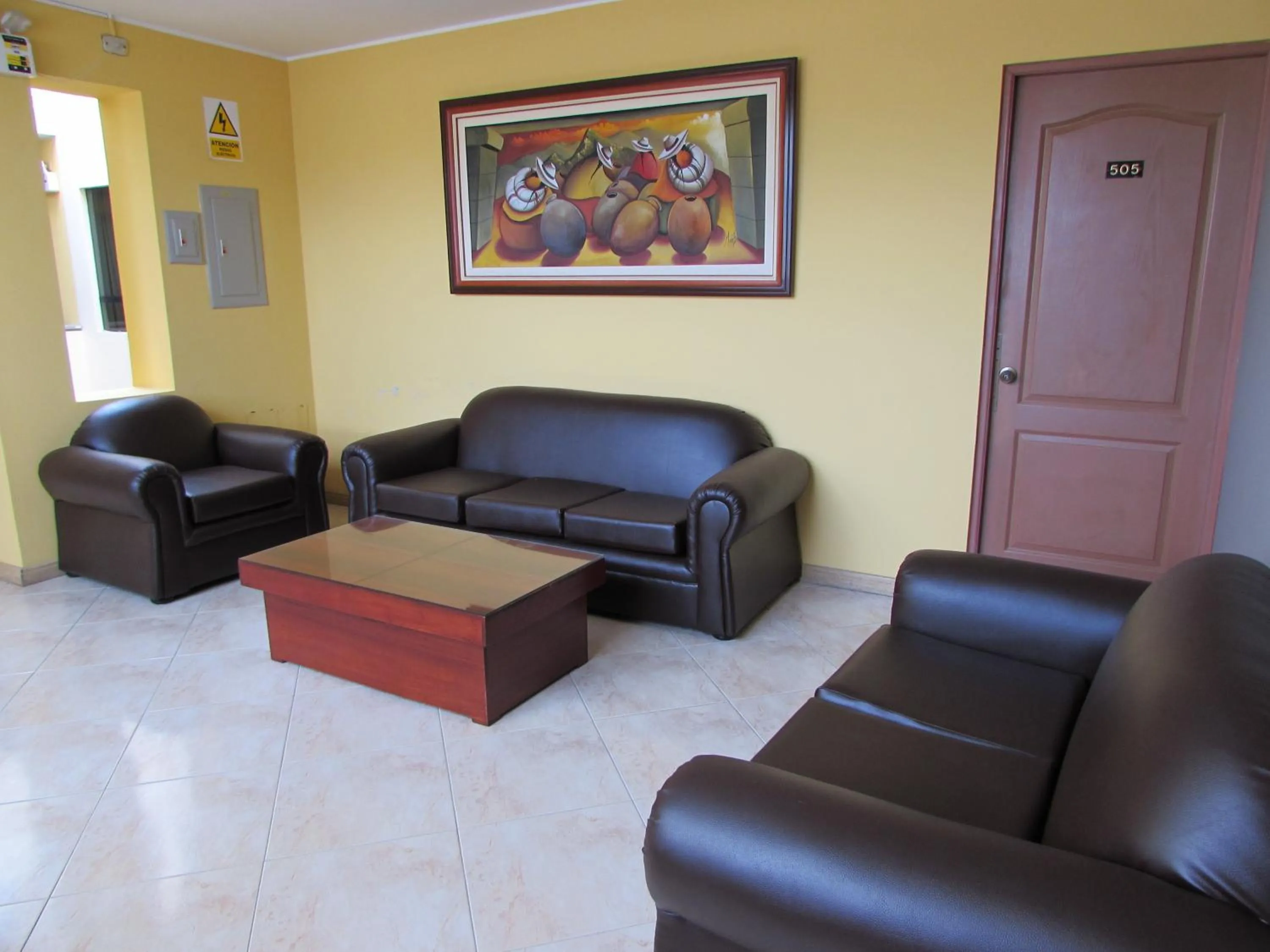 Communal lounge/ TV room in Hotel Bohemia