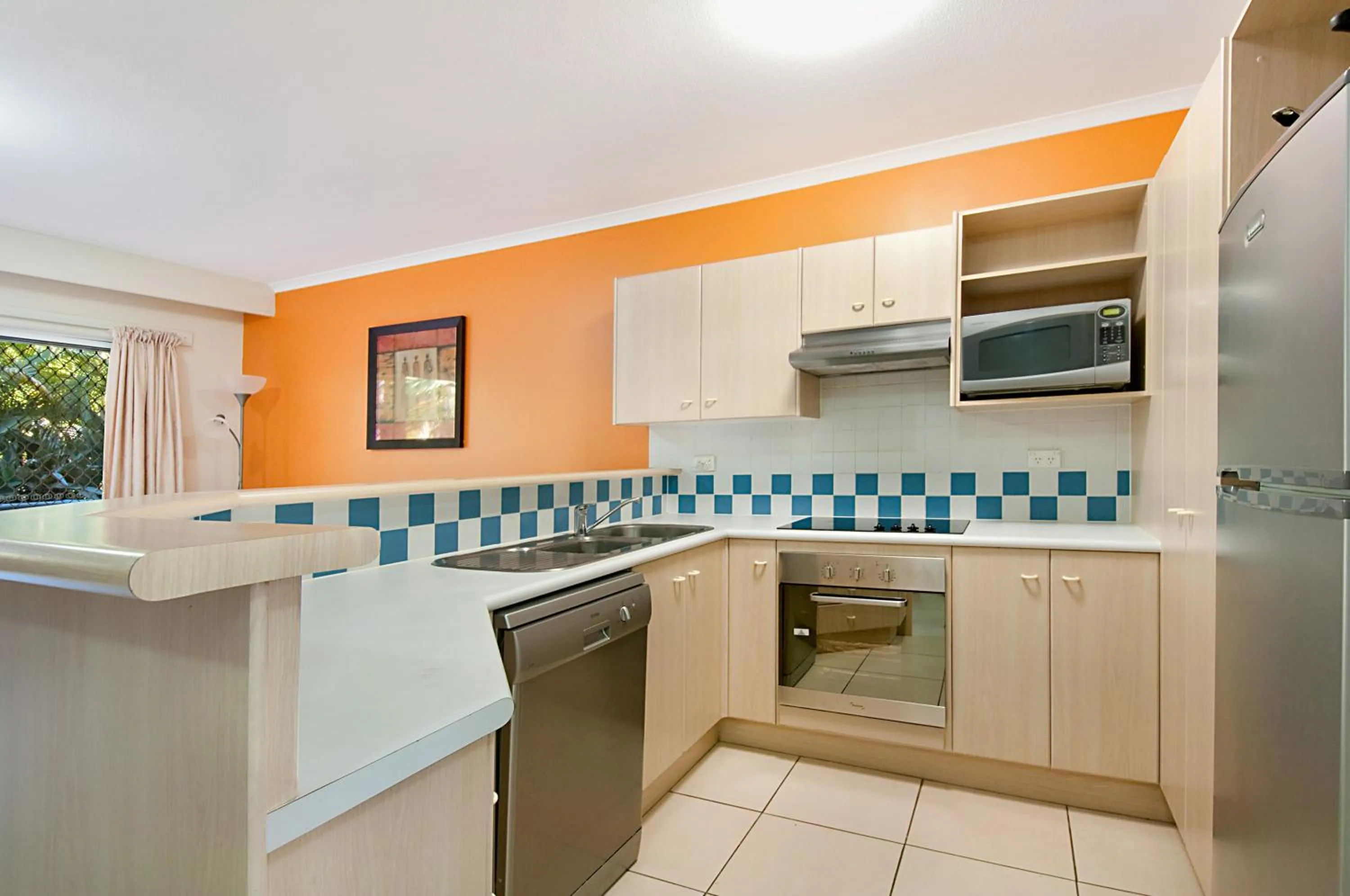 Kitchen or kitchenette in Blue Waters Apartments