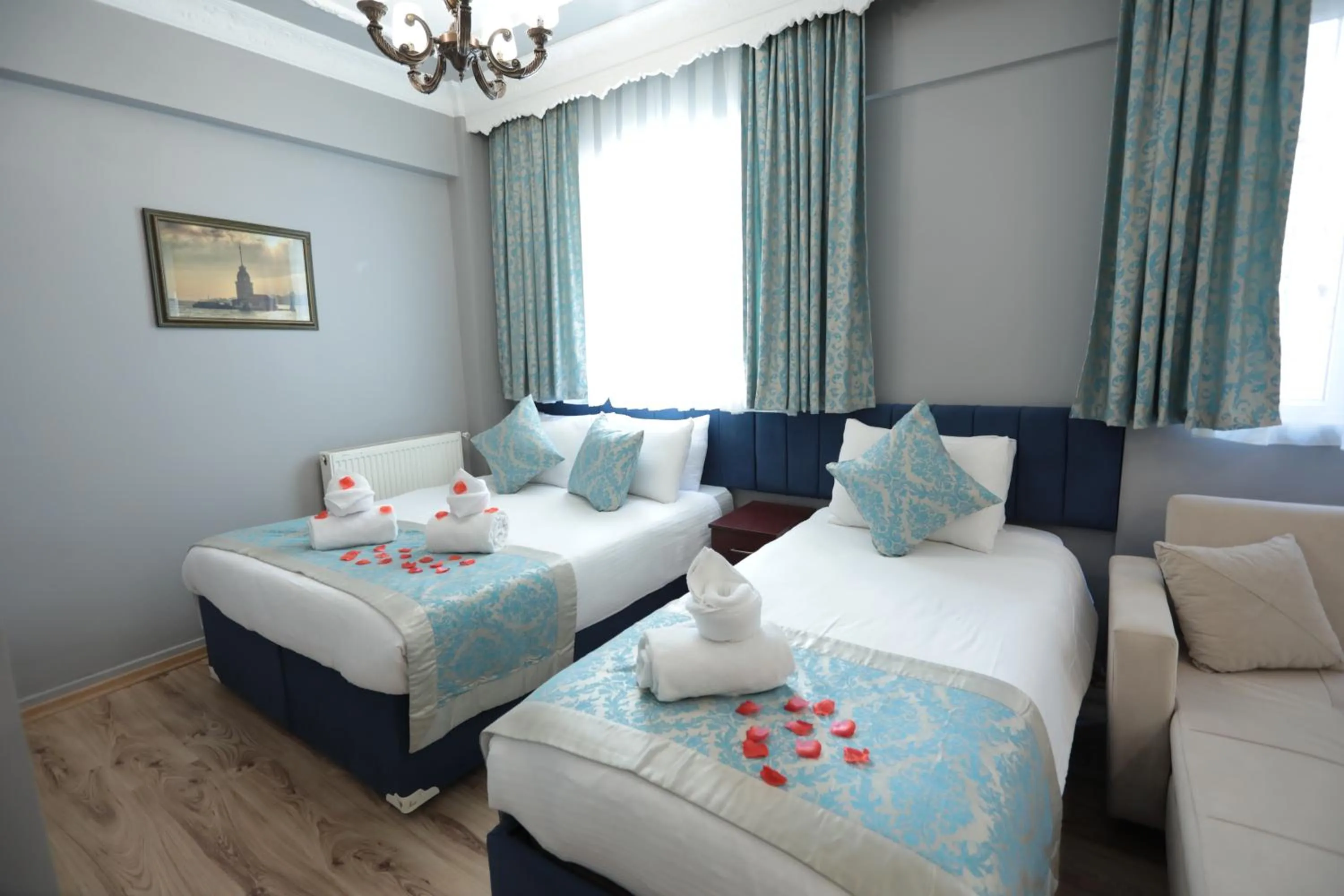 Bed in White Pearl Apart Hotel