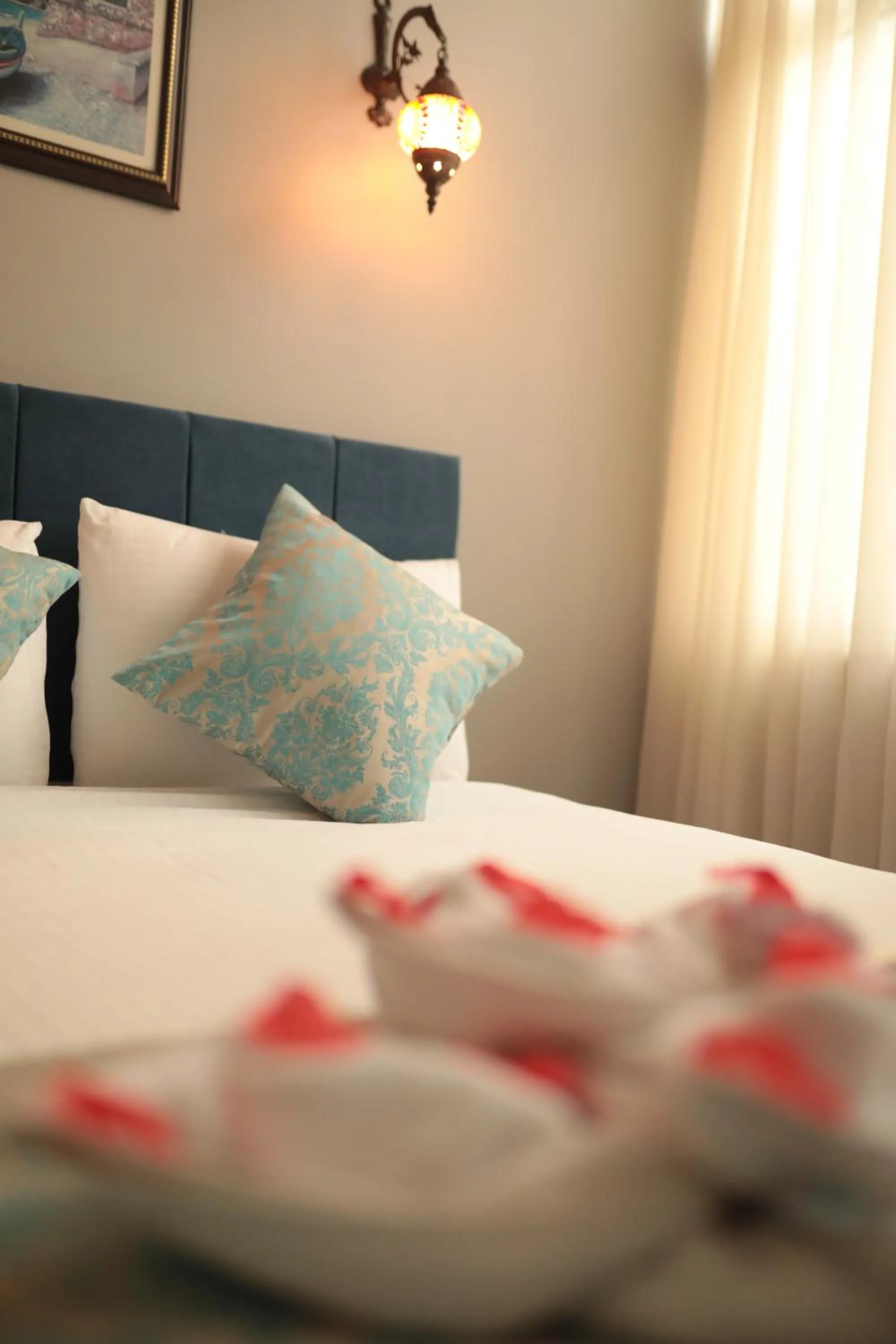 Bed in White Pearl Apart Hotel