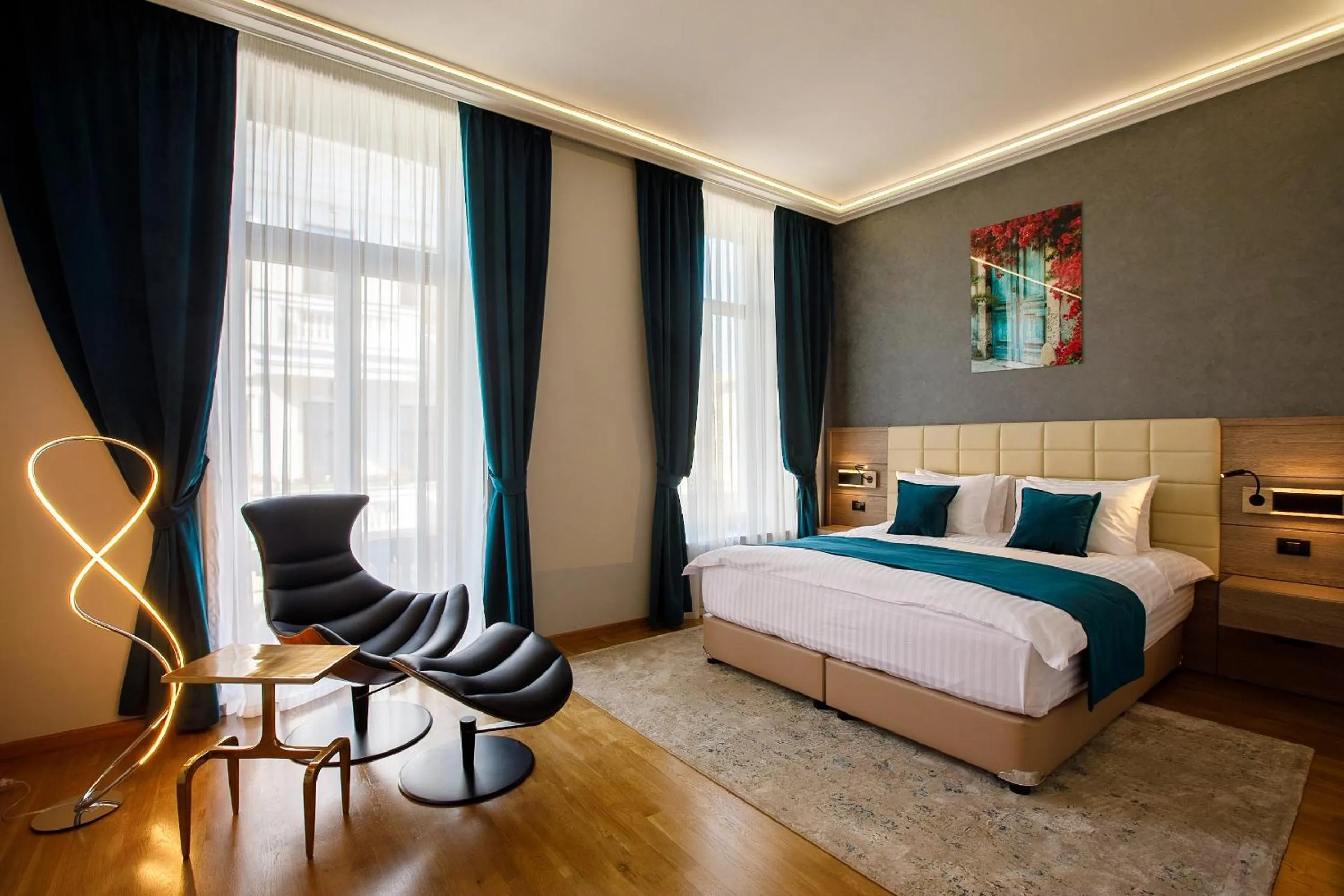 Seating area, Bed in Casa Hrisicos