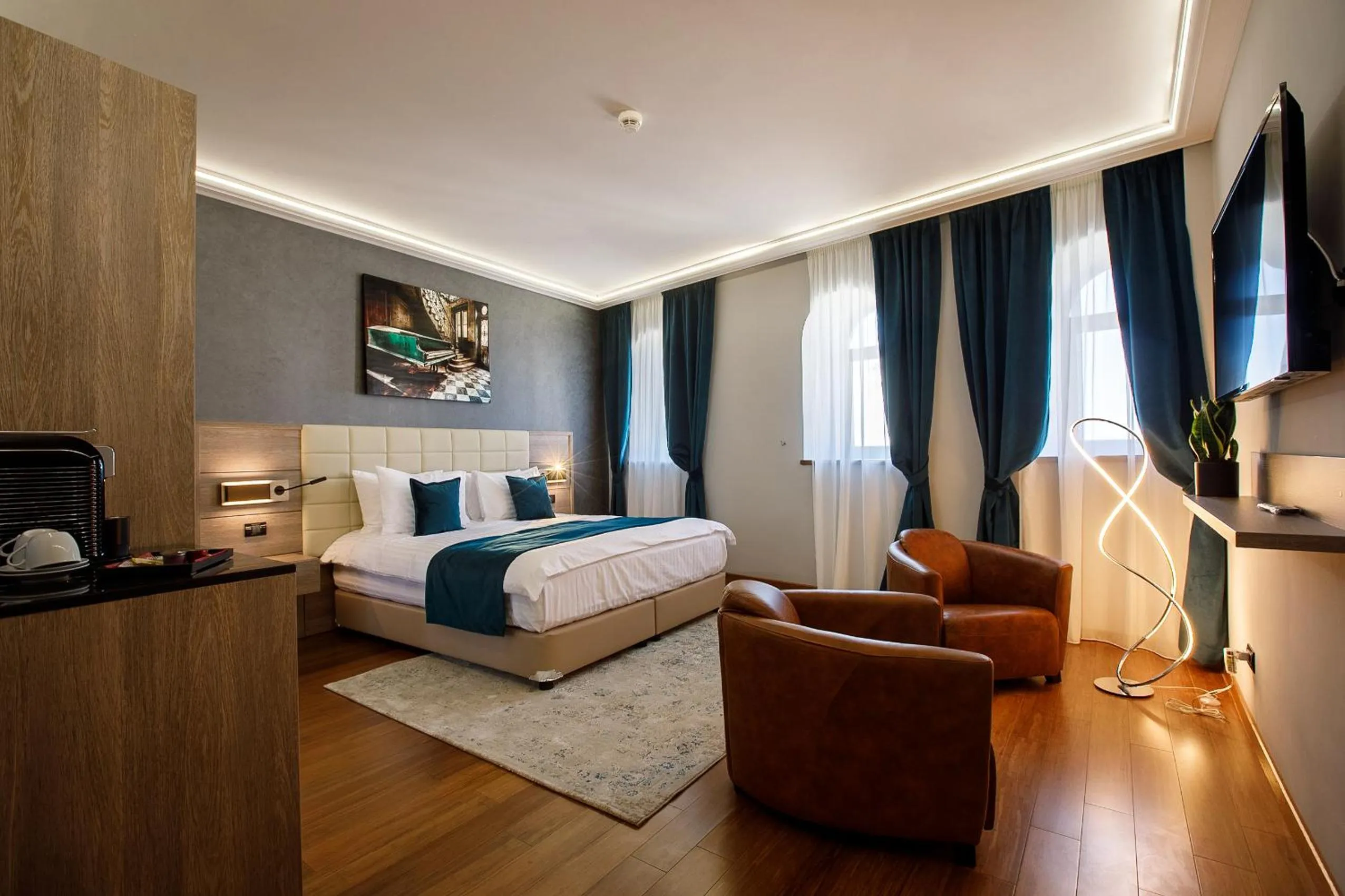 Seating area, Bed in Casa Hrisicos