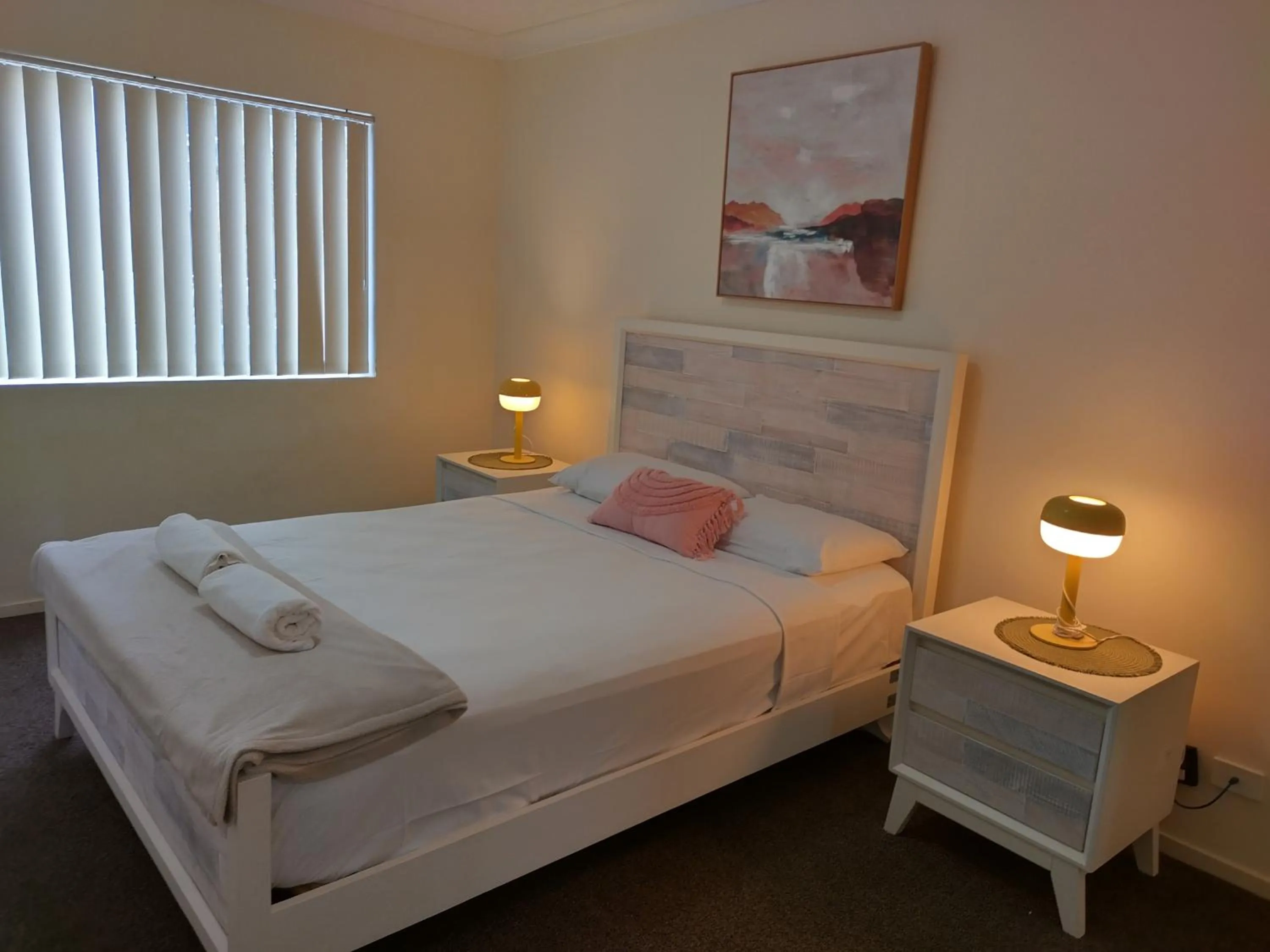 Bed in Splendido Resort Apartments