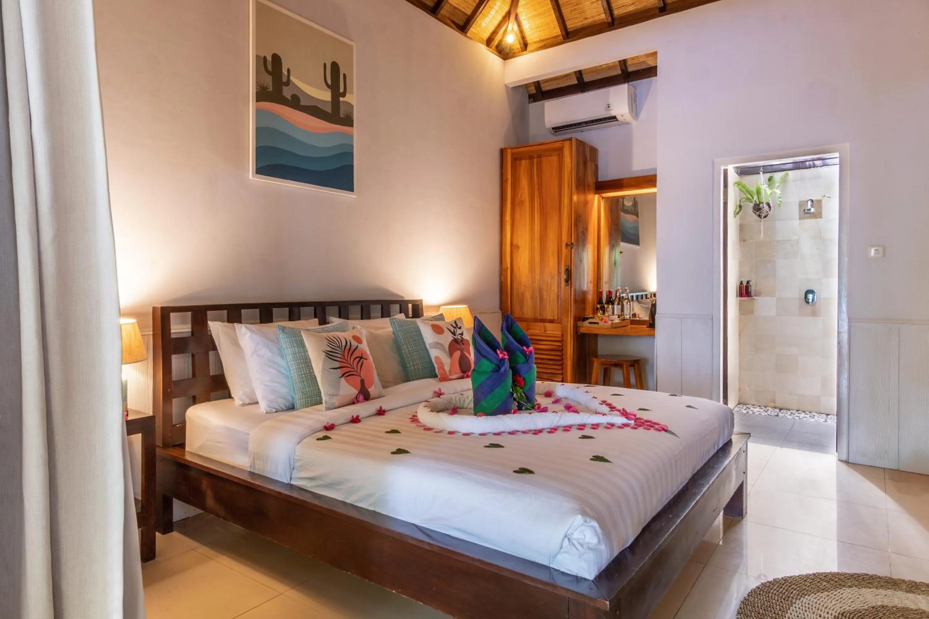 Bed in Bale Sampan Boutique Bungalows