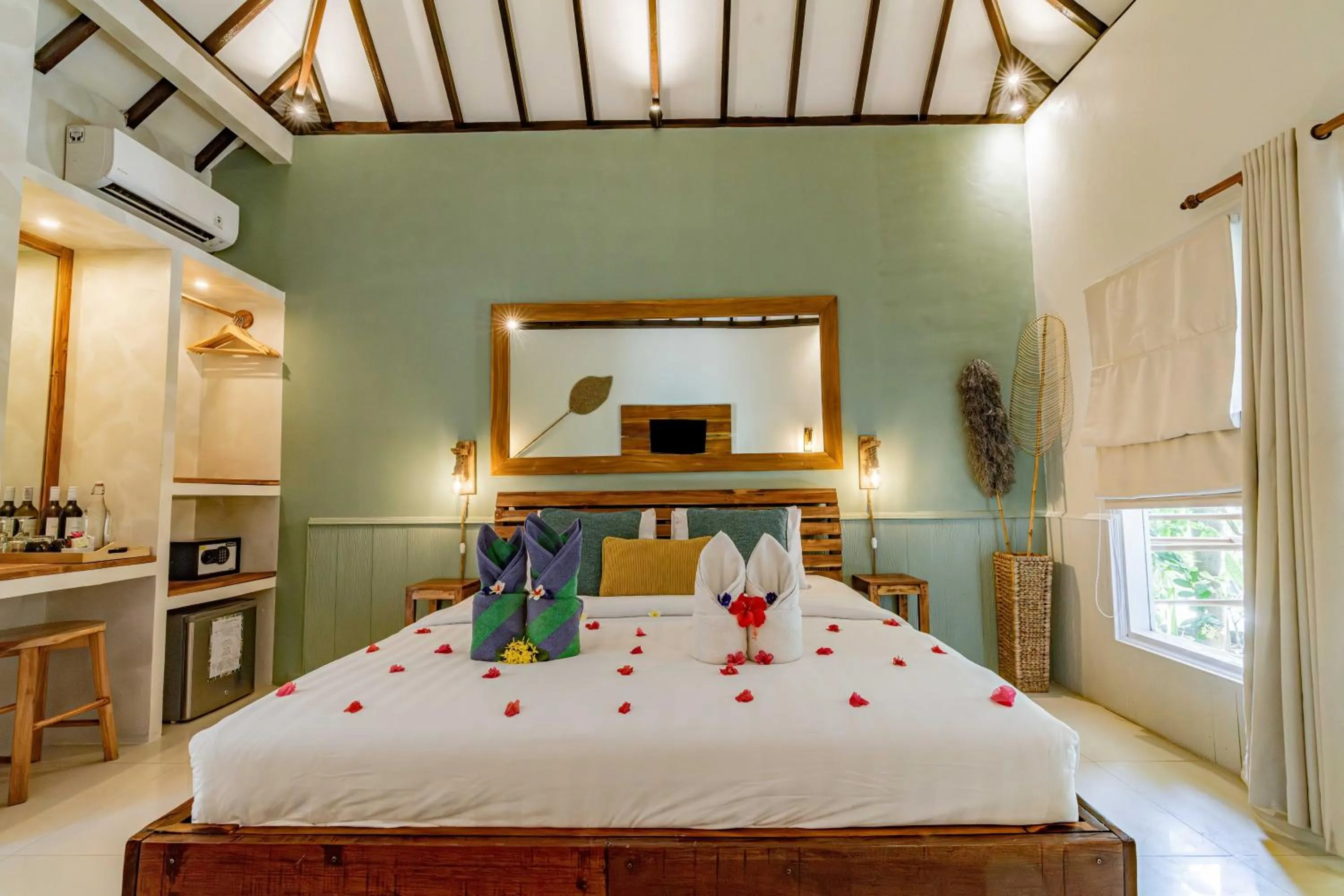 Bed in Bale Sampan Boutique Bungalows