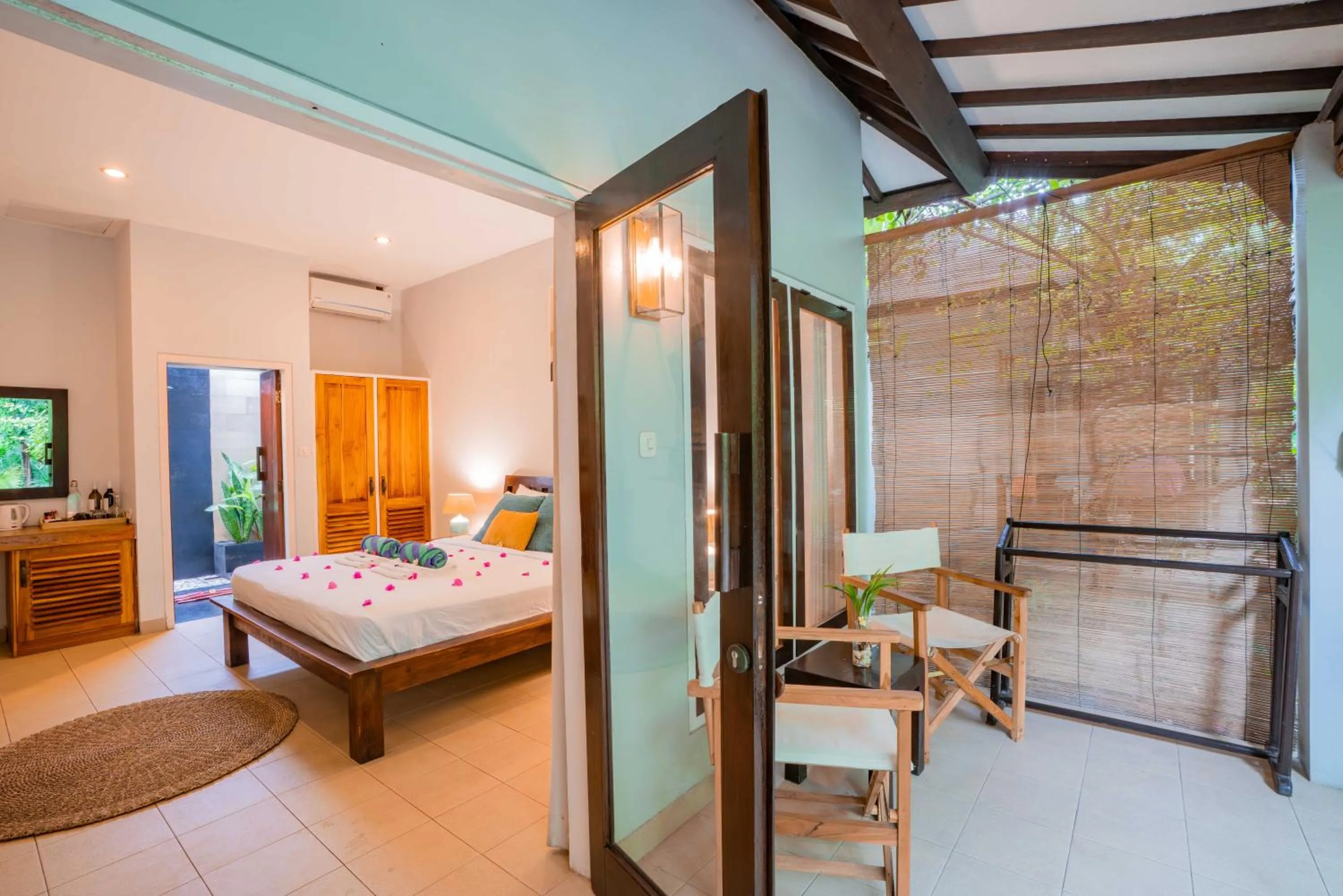 Bed in Bale Sampan Boutique Bungalows