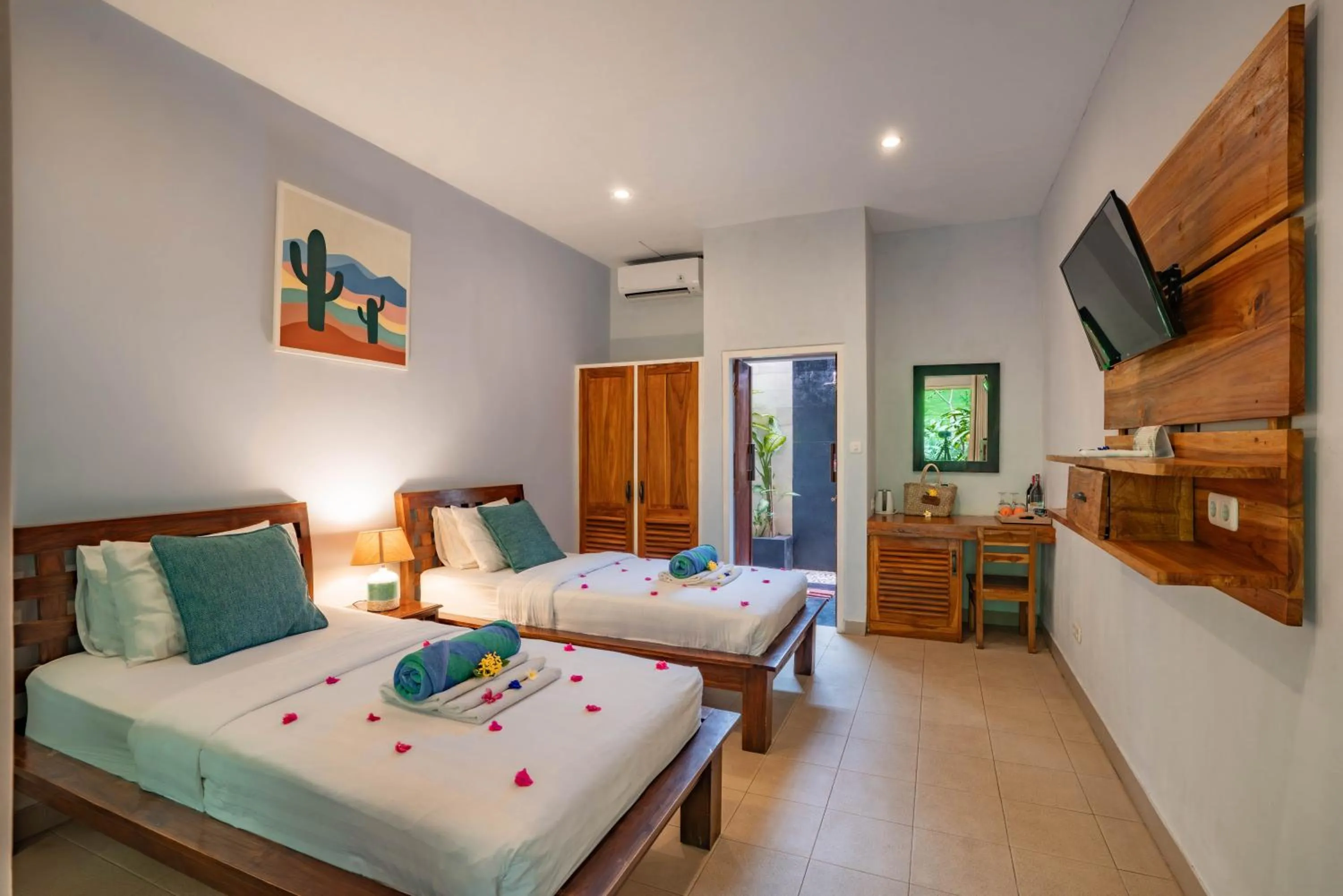 Bed in Bale Sampan Boutique Bungalows