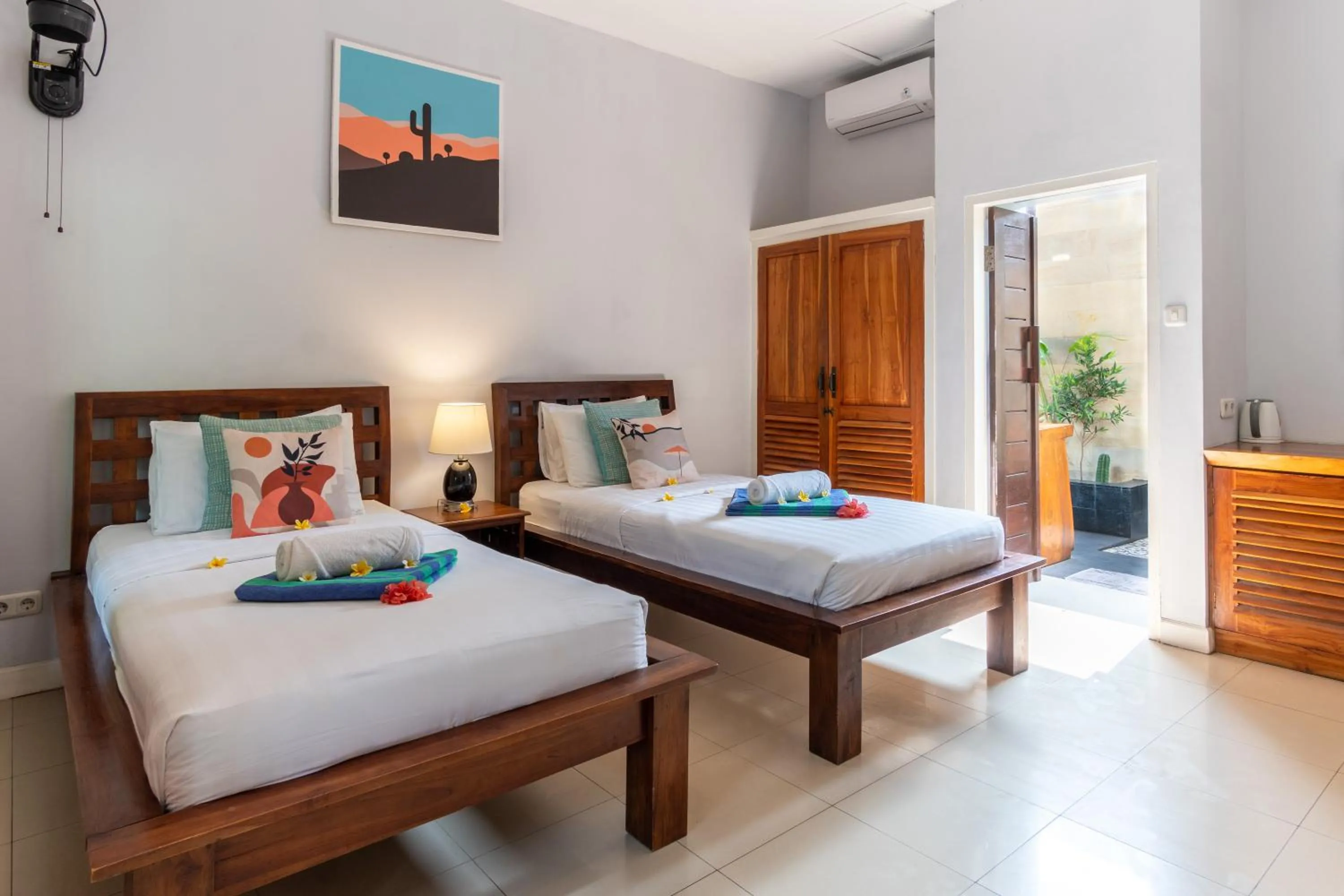 Bed in Bale Sampan Boutique Bungalows