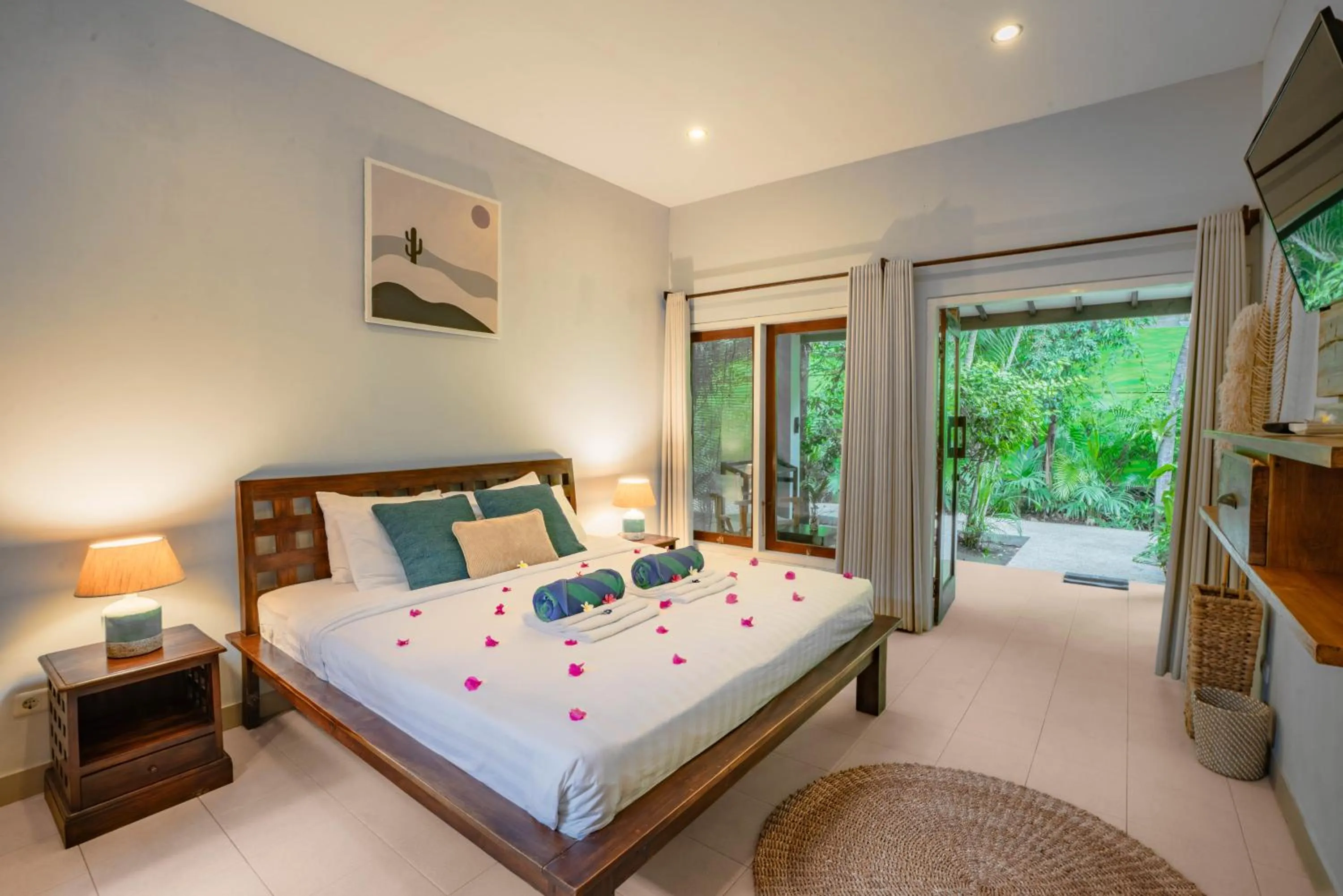 Bed in Bale Sampan Boutique Bungalows