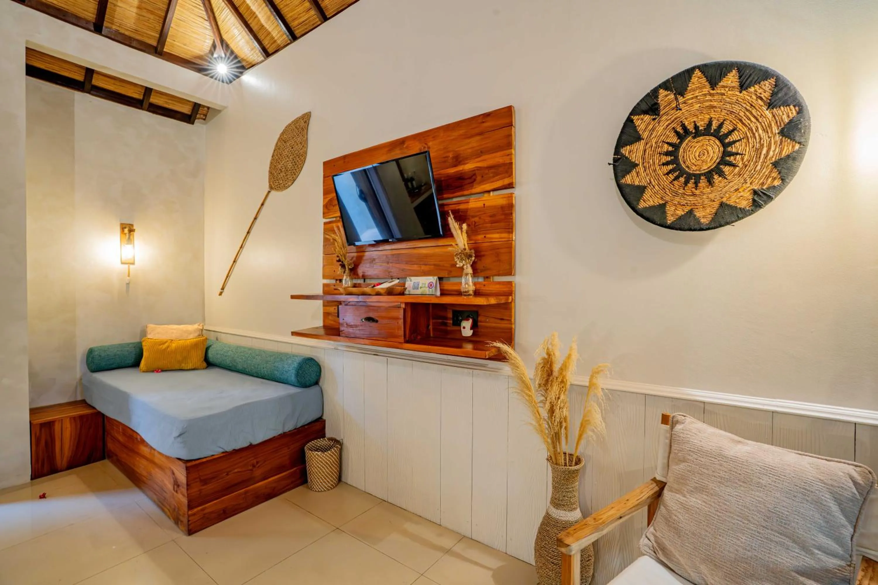 Bed in Bale Sampan Boutique Bungalows
