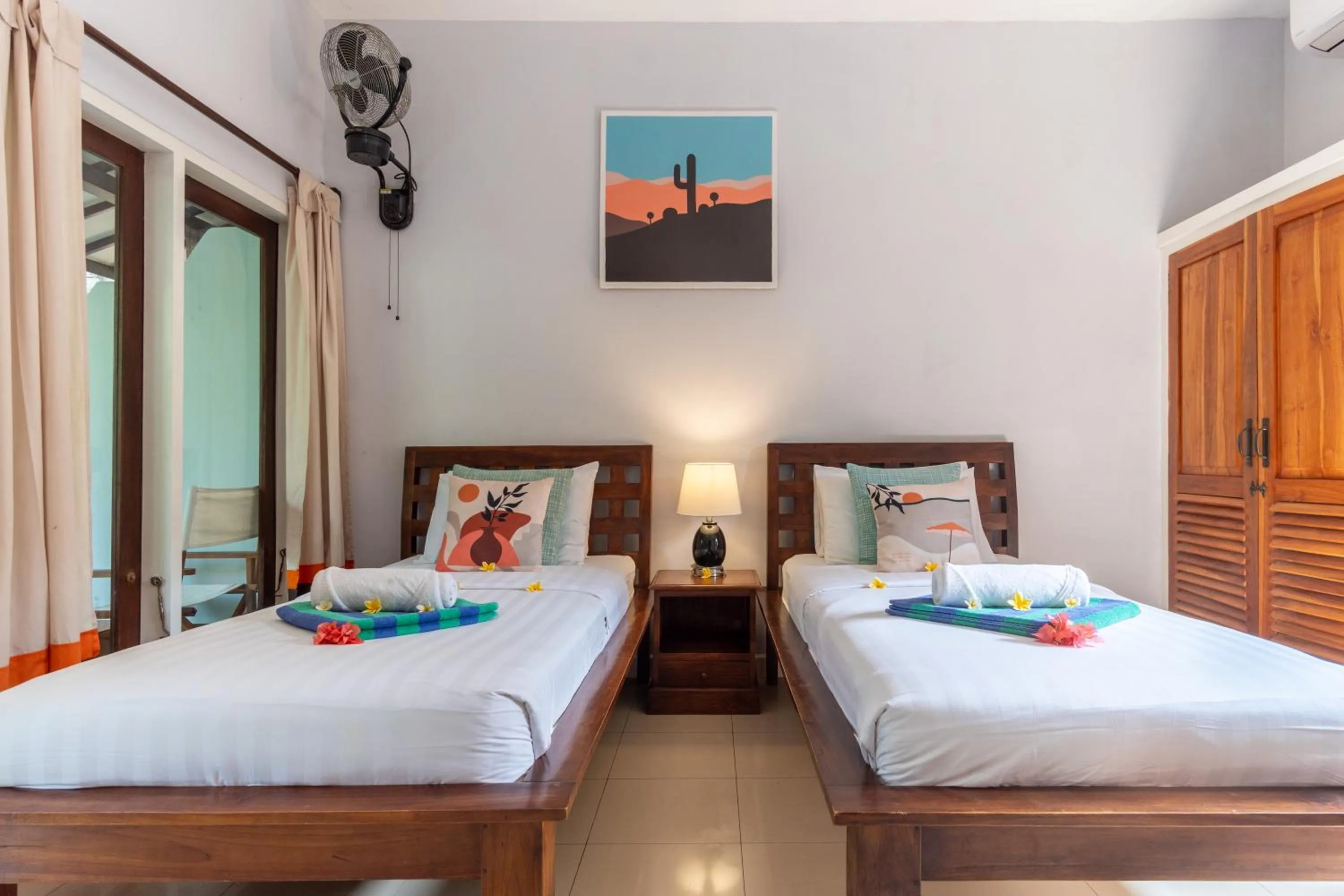 Bed in Bale Sampan Boutique Bungalows