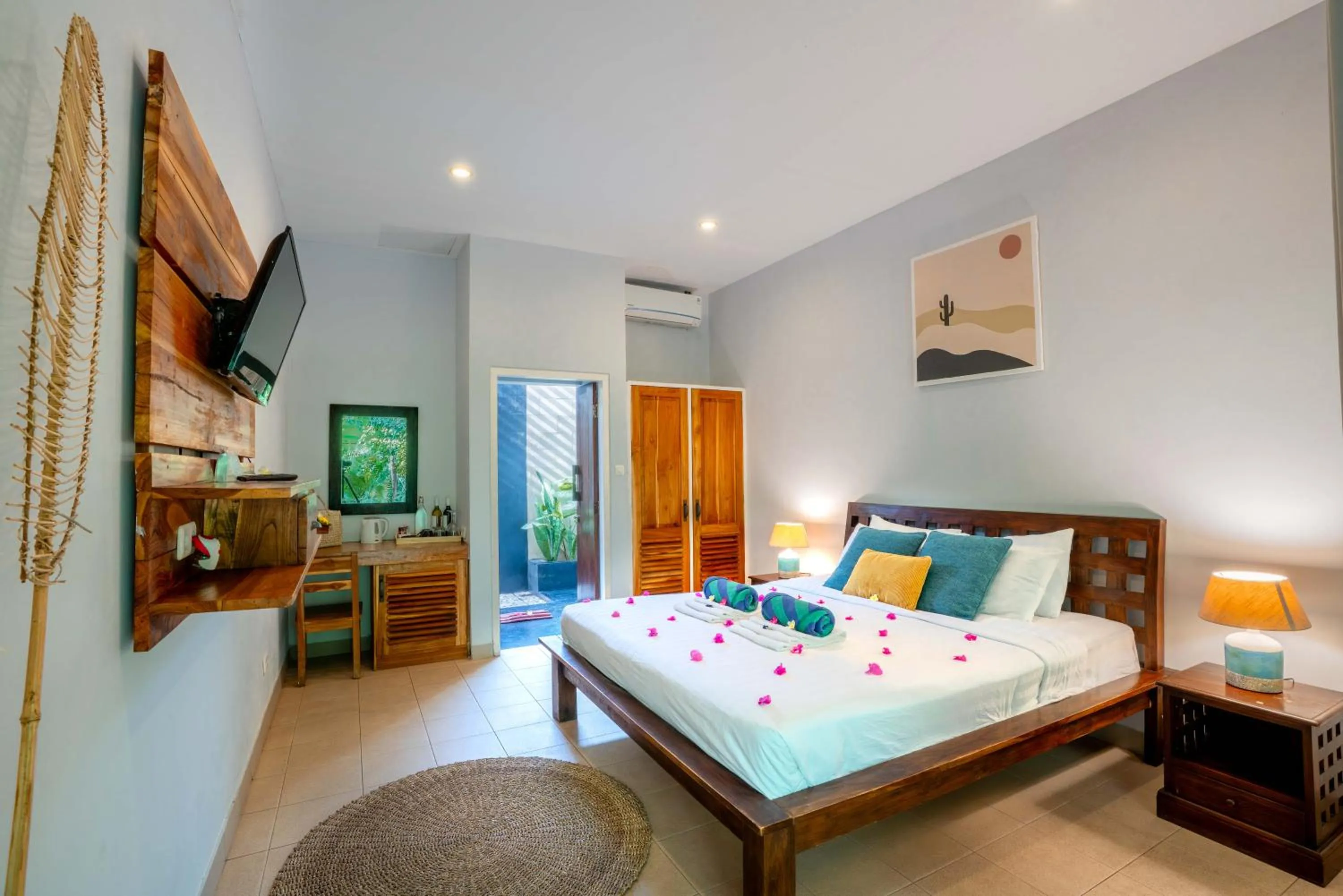 Bed in Bale Sampan Boutique Bungalows