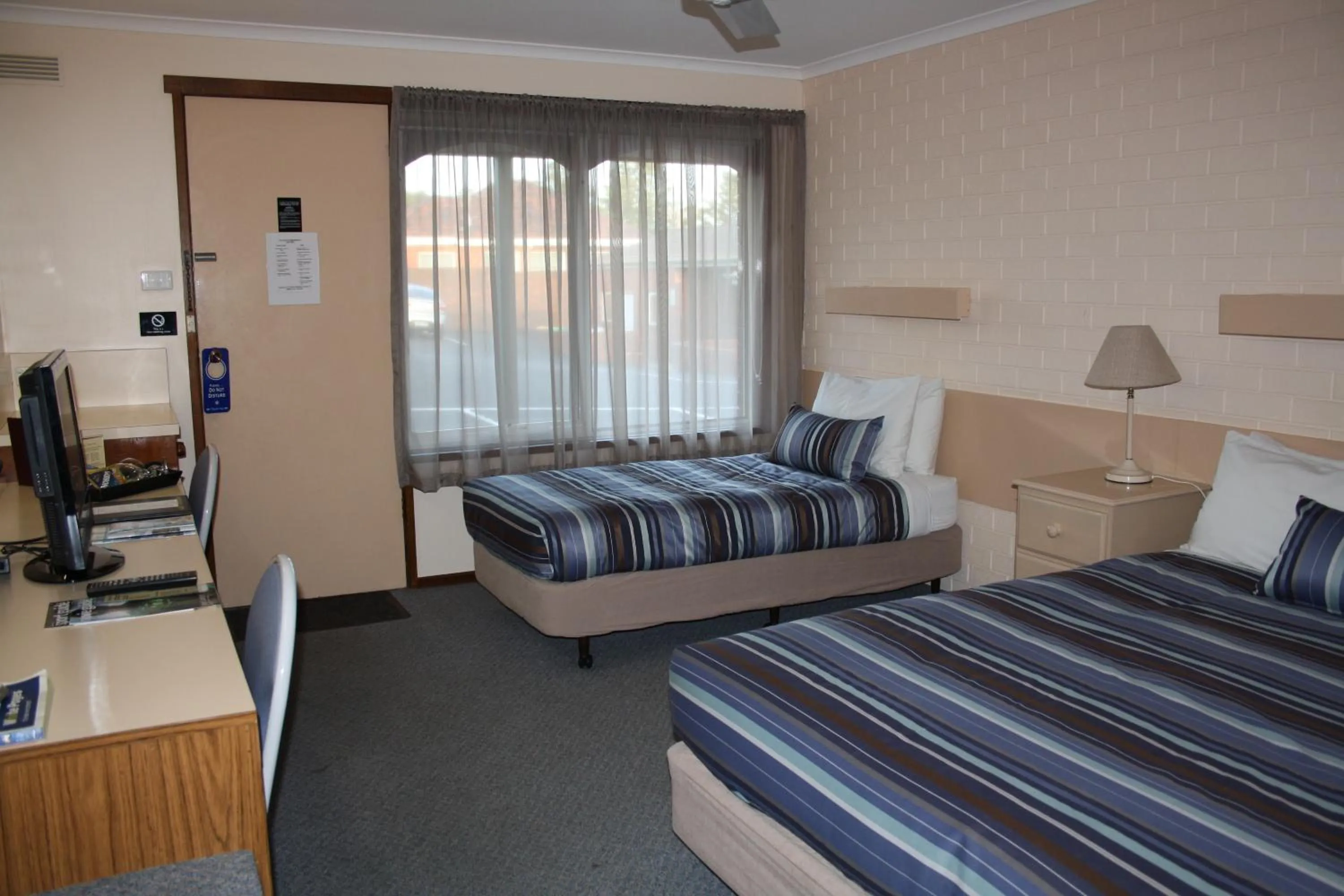 Bed in Raglan Motor Inn