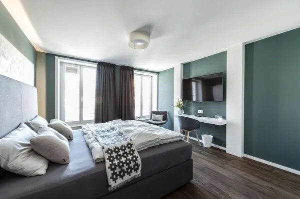 Photo of the whole room, Bed in wolke 4