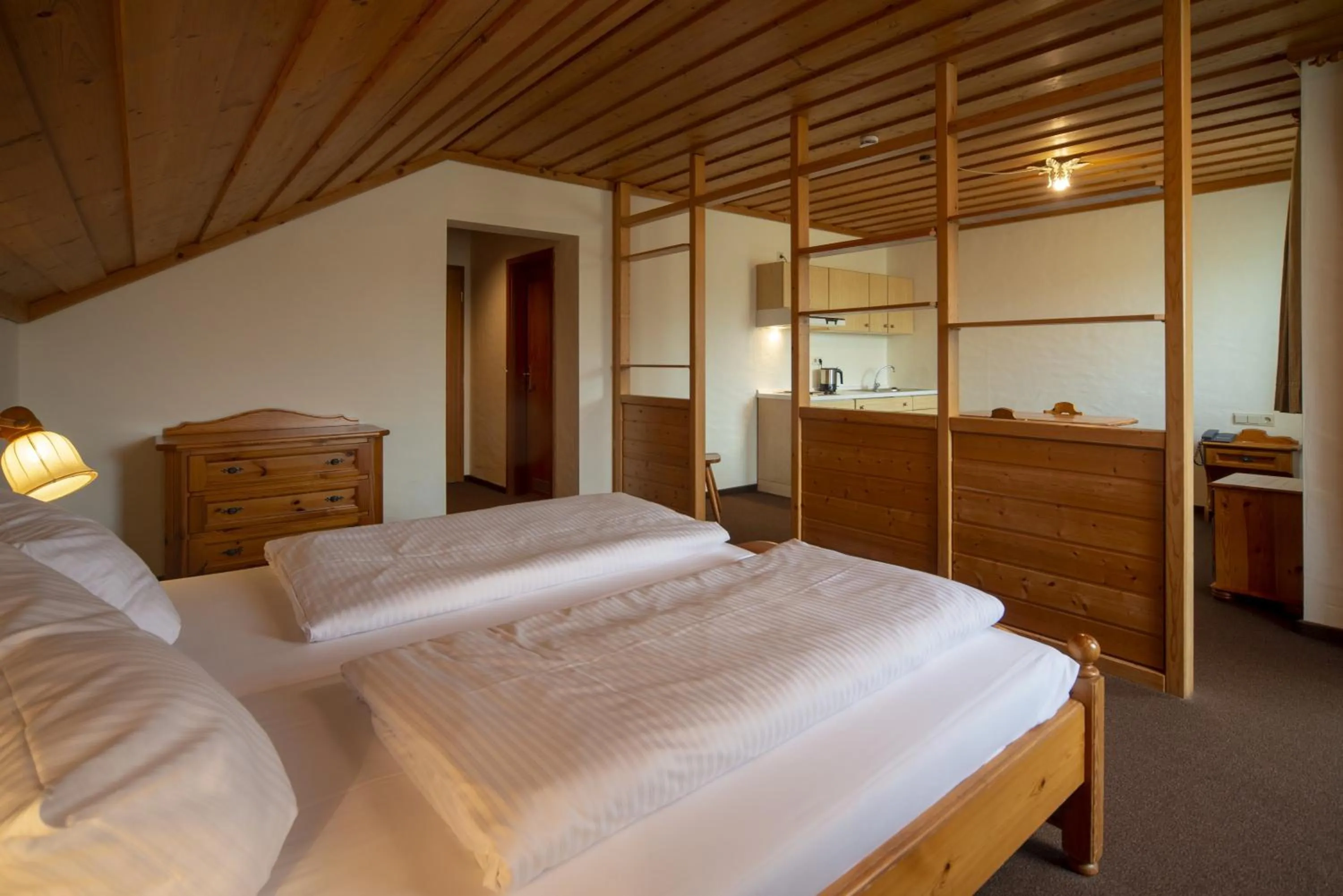 Photo of the whole room, Bed in Seehotel Weissensee