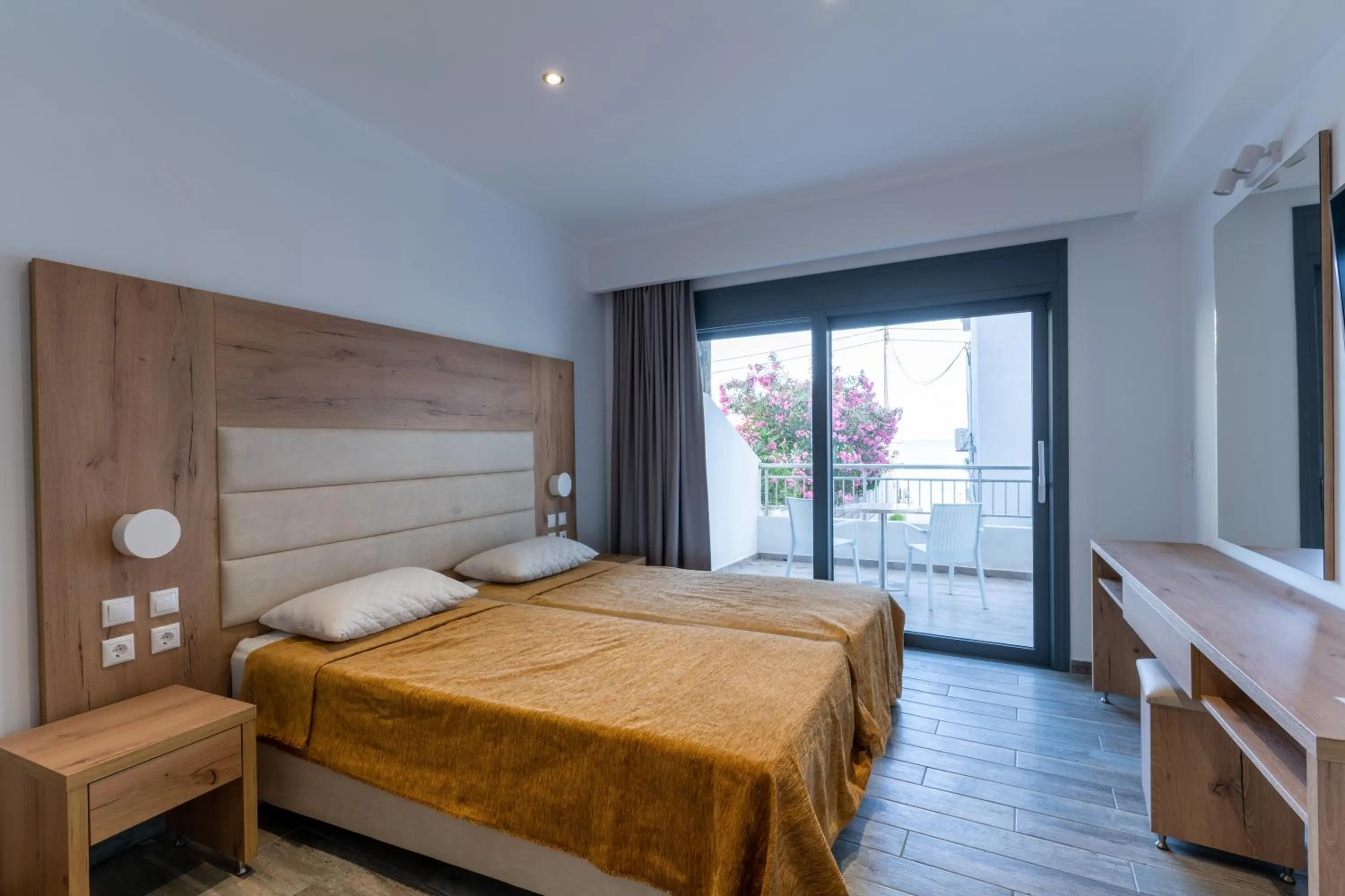 Bed in Mandala Seafront Suites